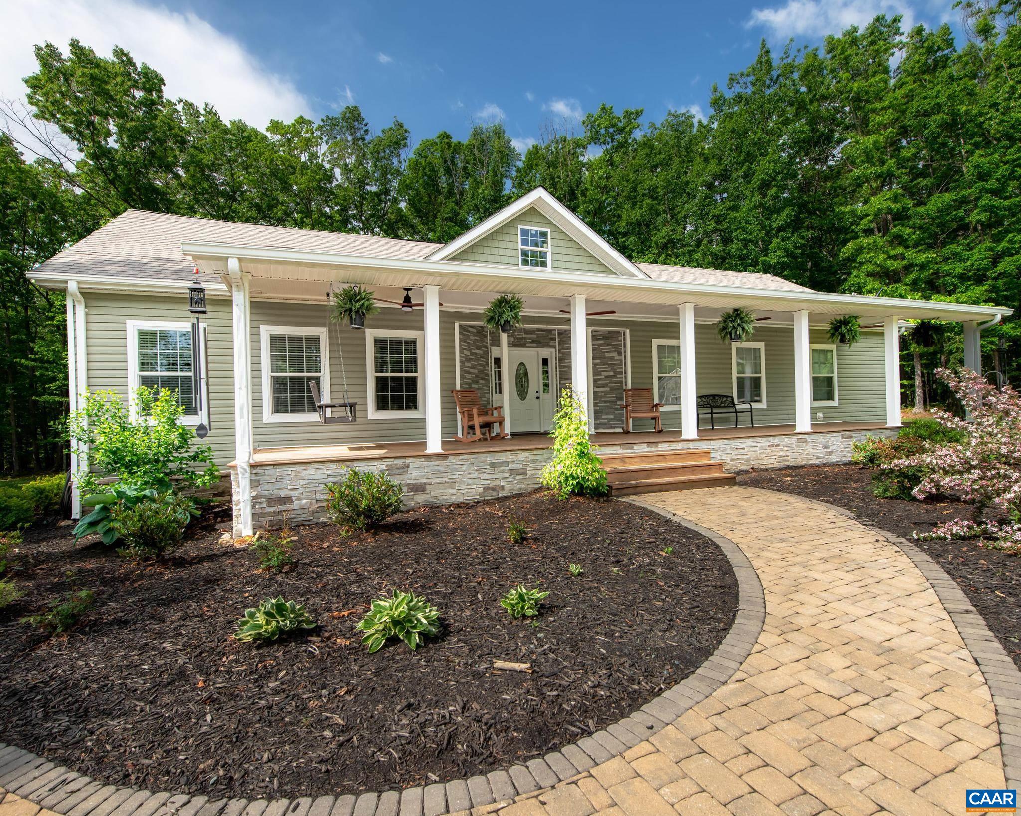 Extensive HARDSCAPE WALKWAYS ALL AROUND the home - wtih