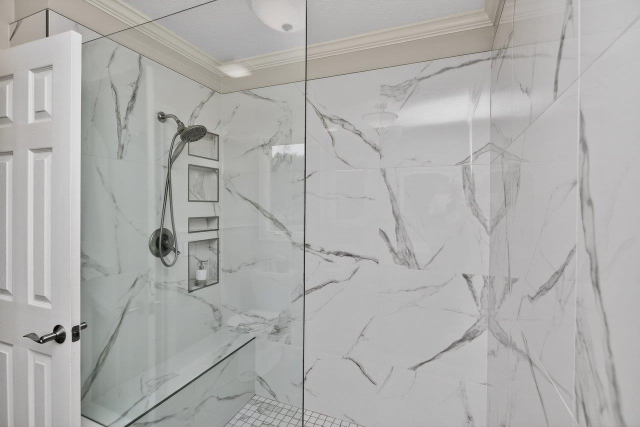 New walk-in curbless marble shower.