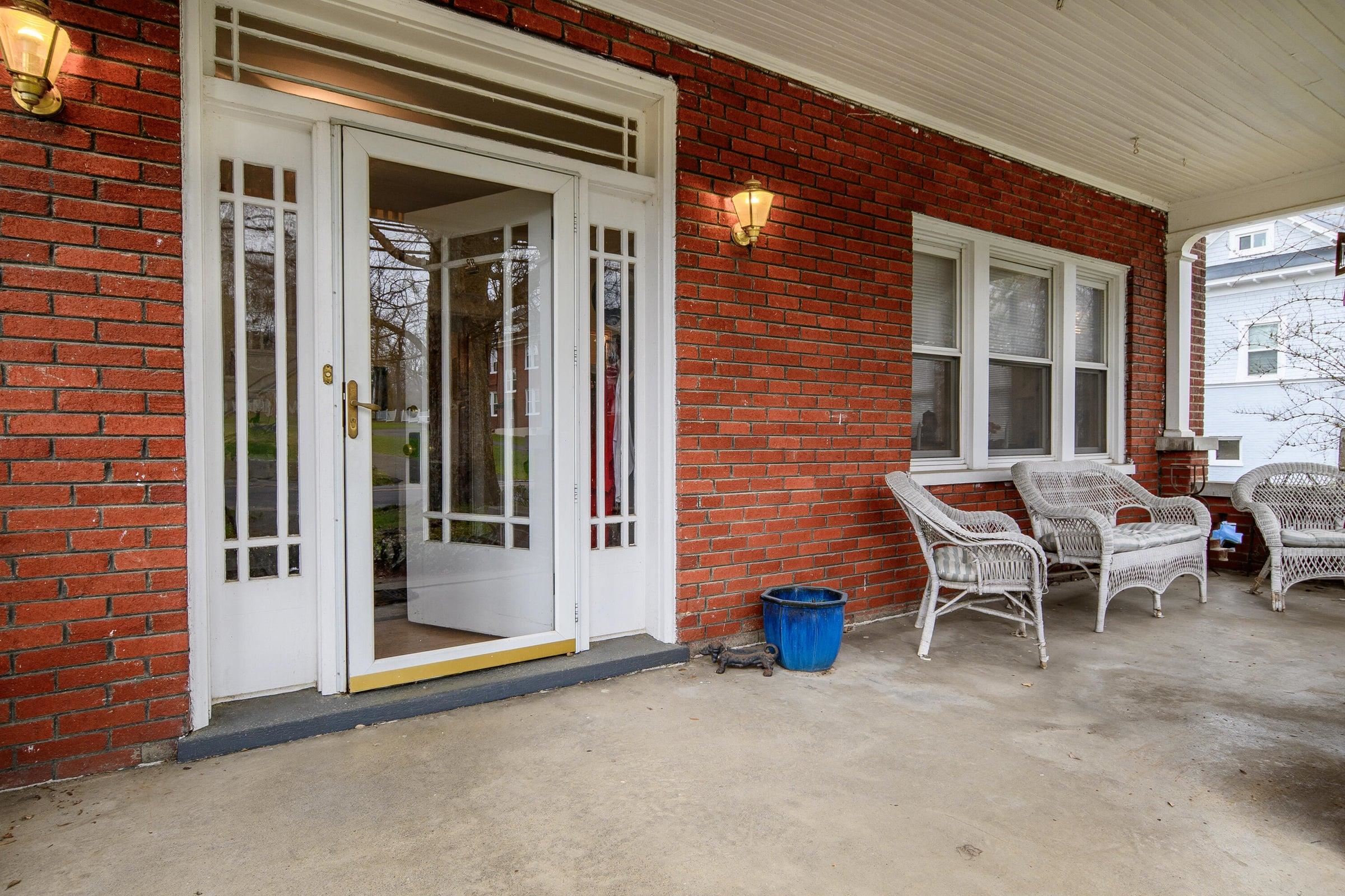 Enjoy the picturesque Main Street setting from your covered front porch.