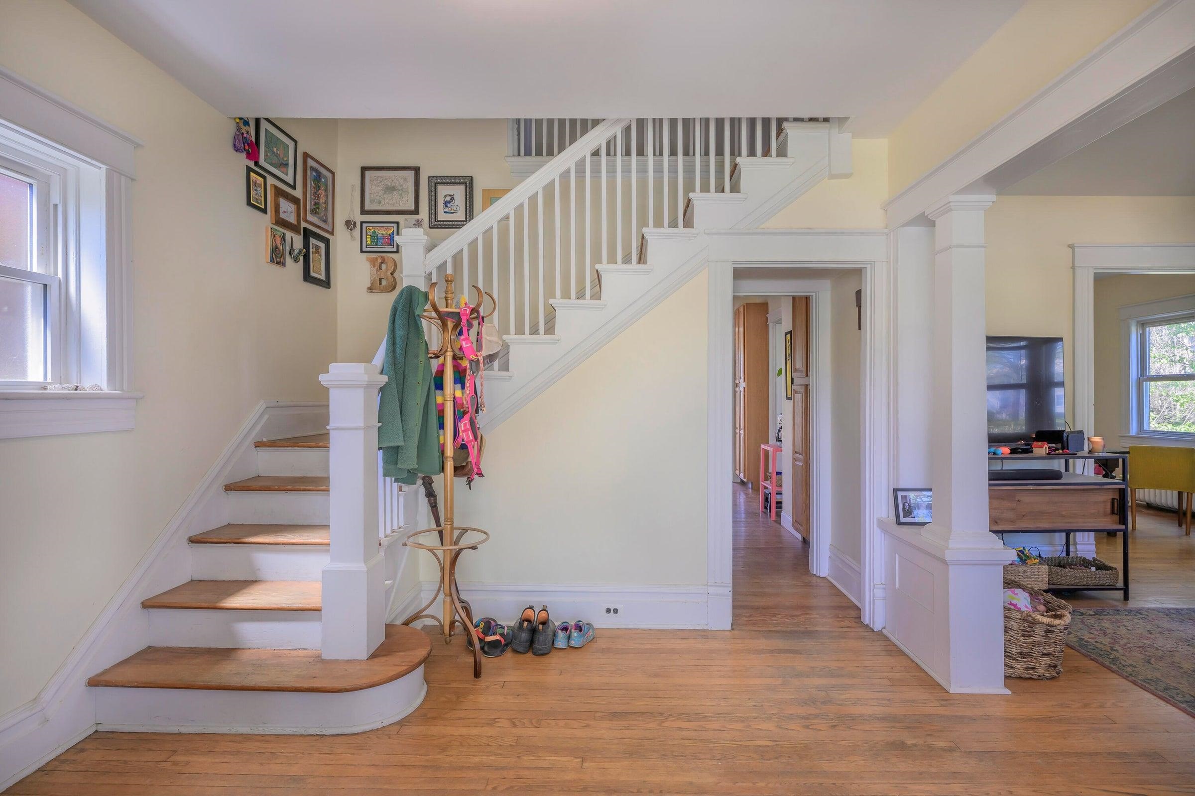 Welcoming entrance foyer illuminated by natural light.