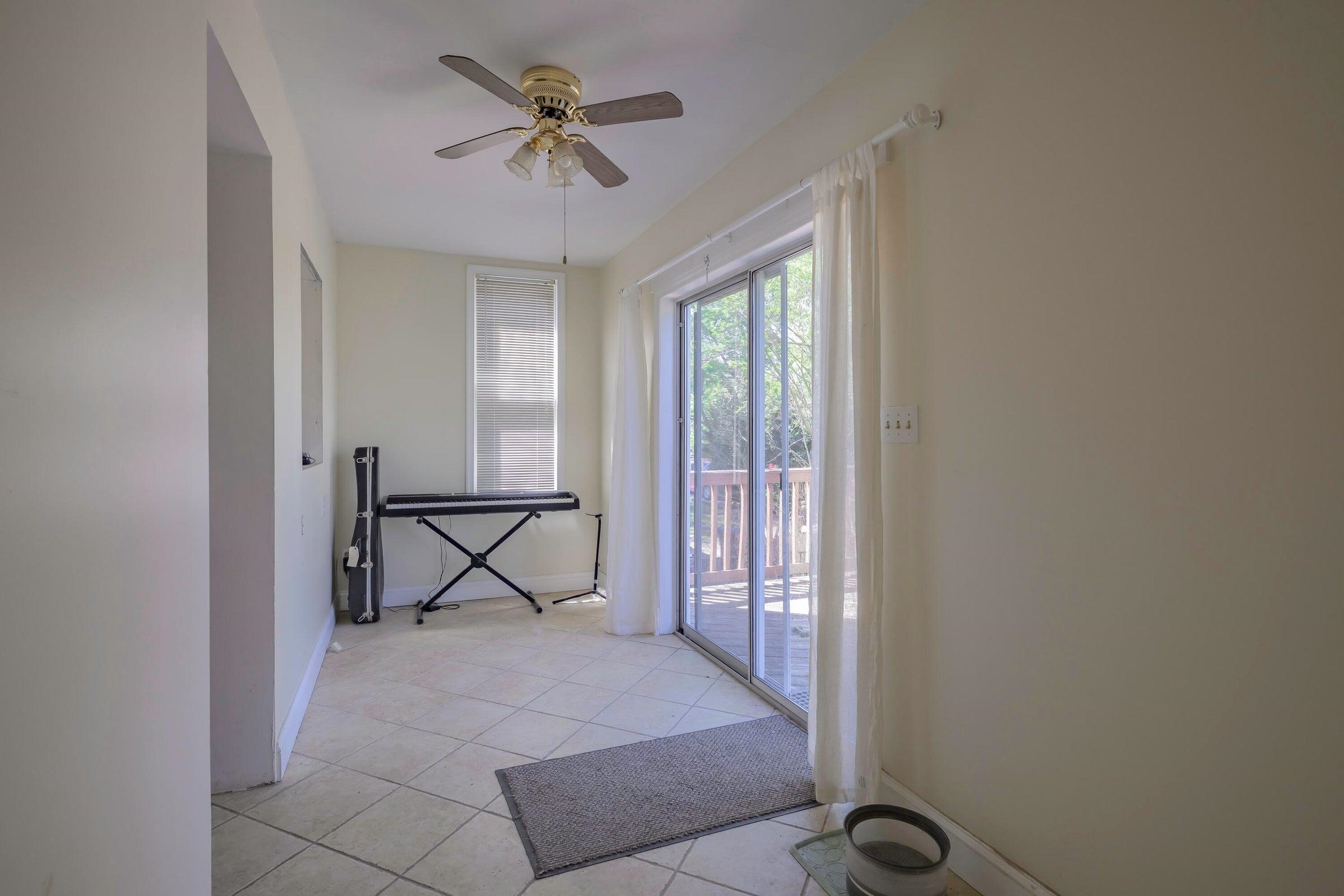 Enjoy watching the birds or sipping coffee from your sunroom addition with half bath.
