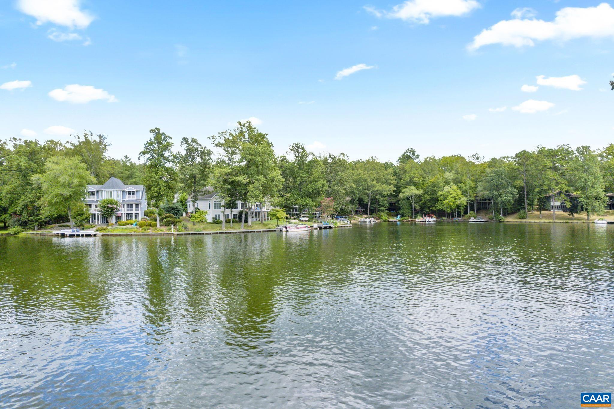 Secured bulkhead and peaceful water vistas. Enjoy outdoor living with a beautifully maintained property.