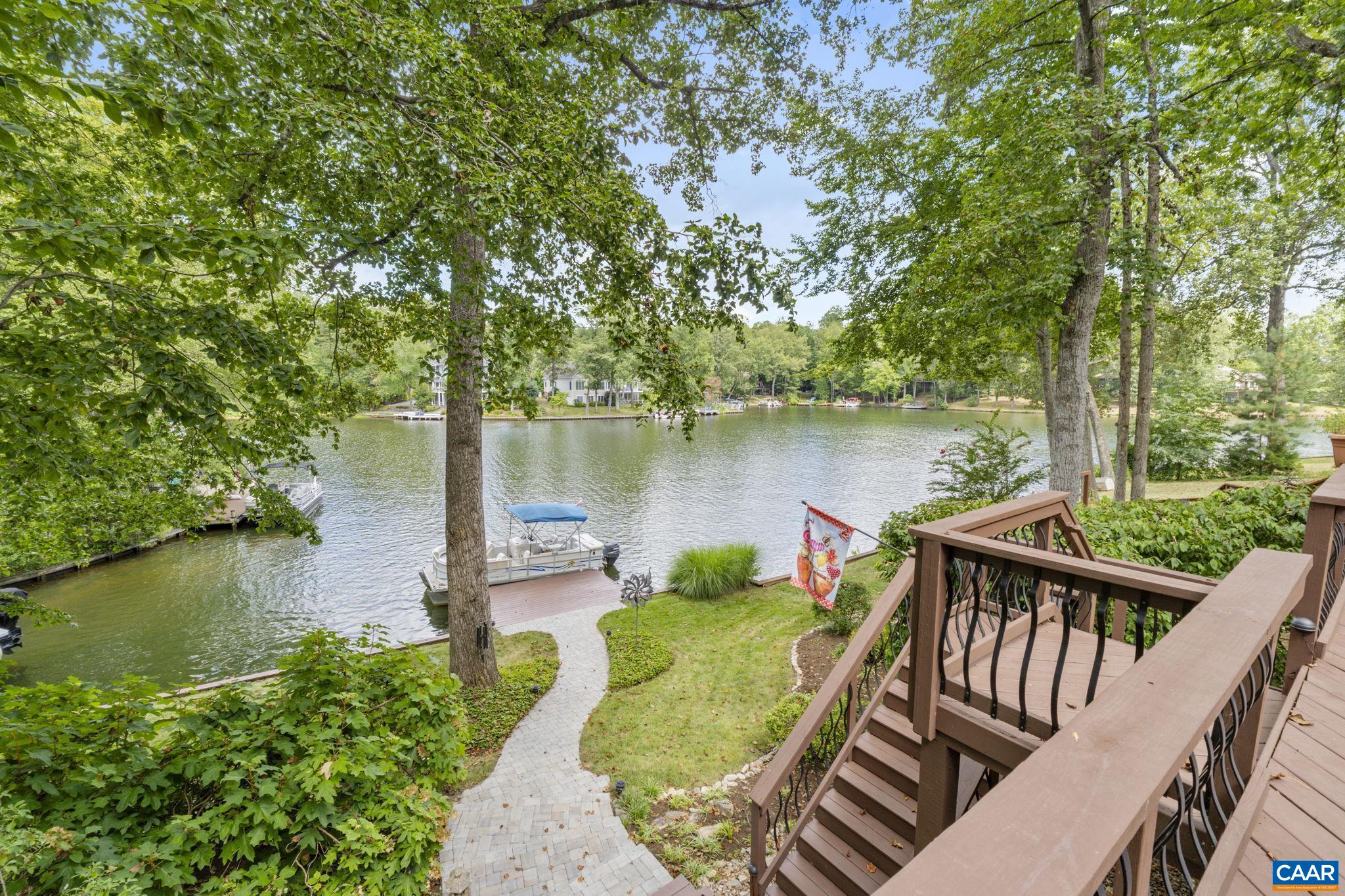 Expansive backyard overlooking the lake-perfect for relaxing or entertaining