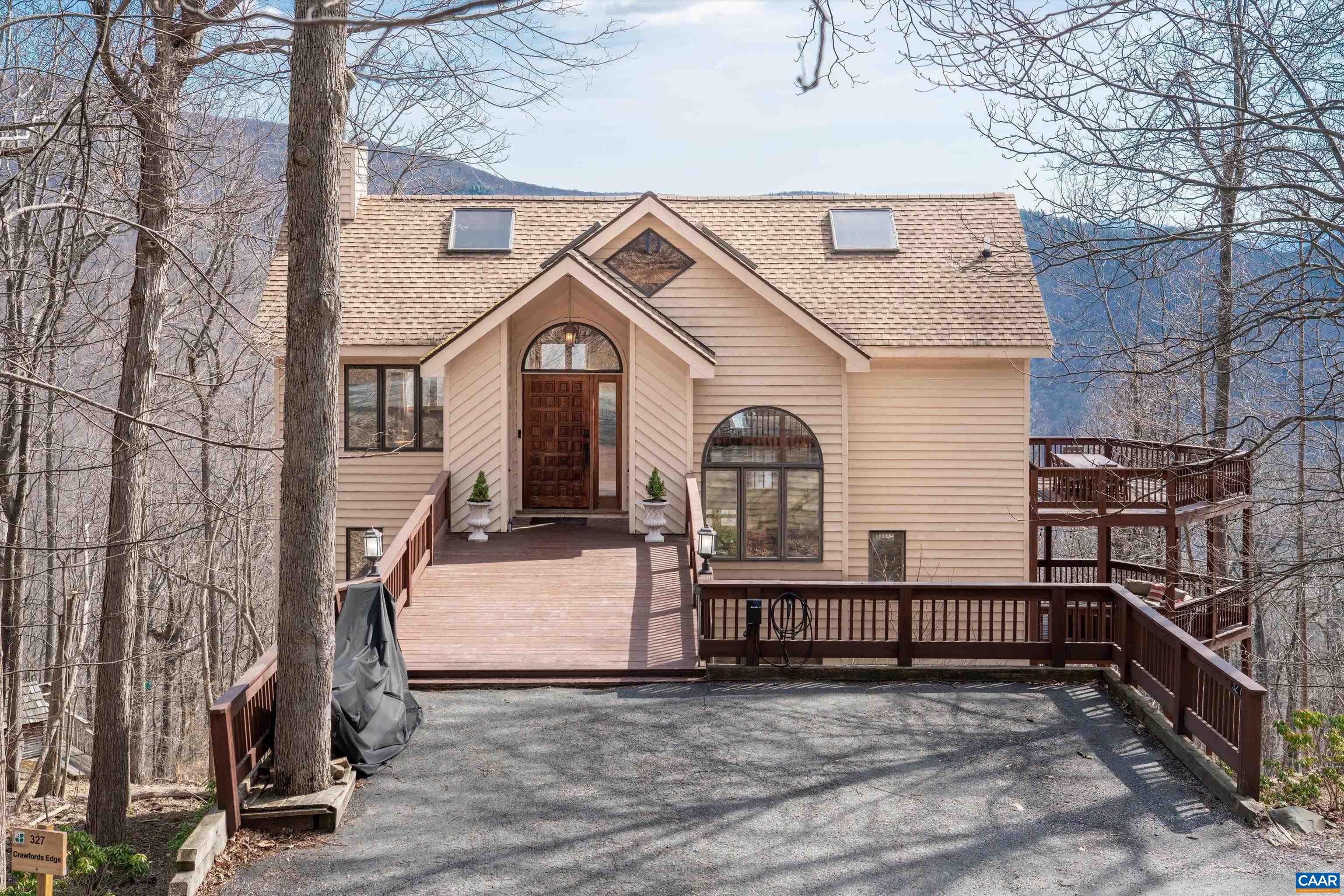 No steps into this mountain home with great views! Exceptional...
