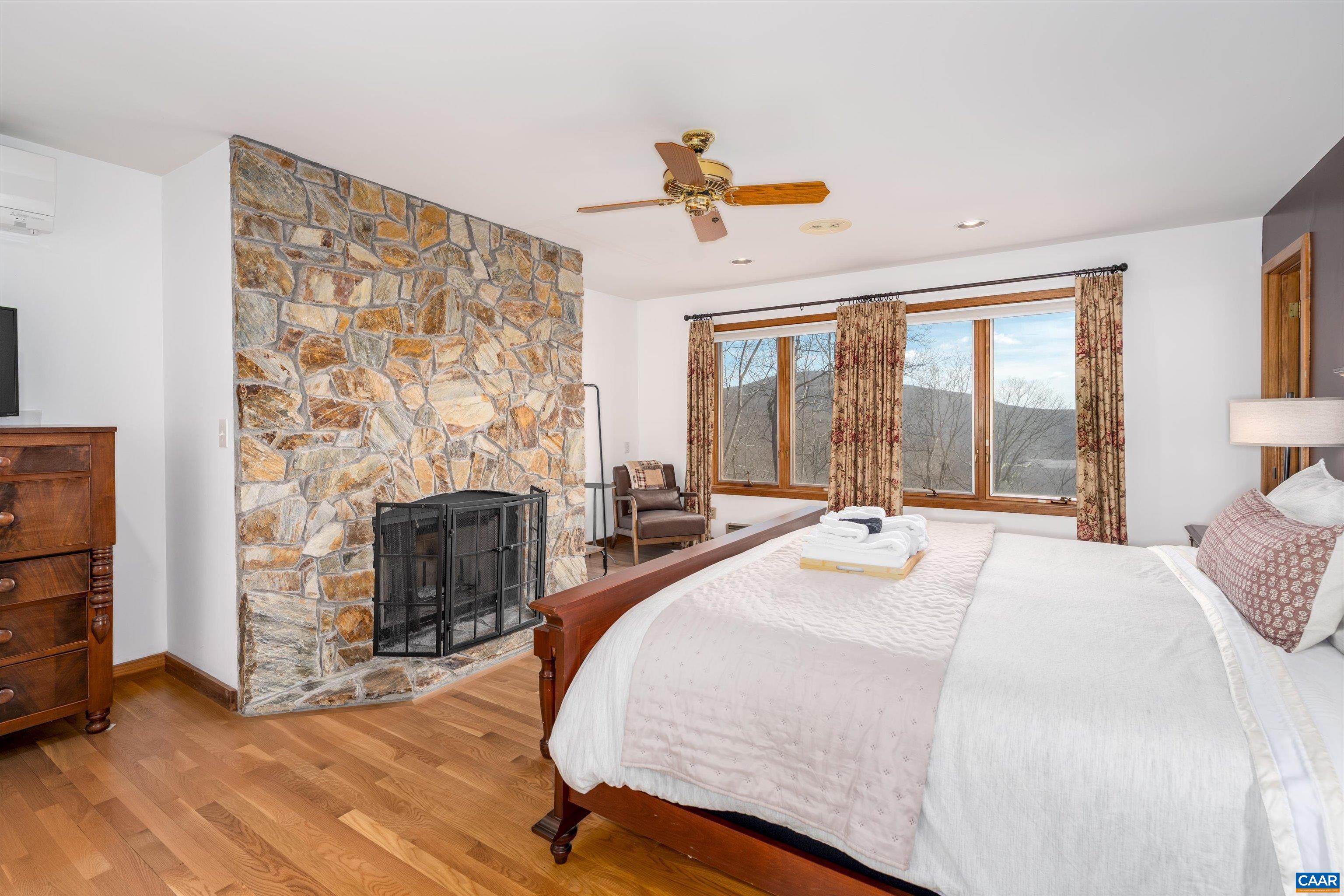 Primary Bedroom with fireplace