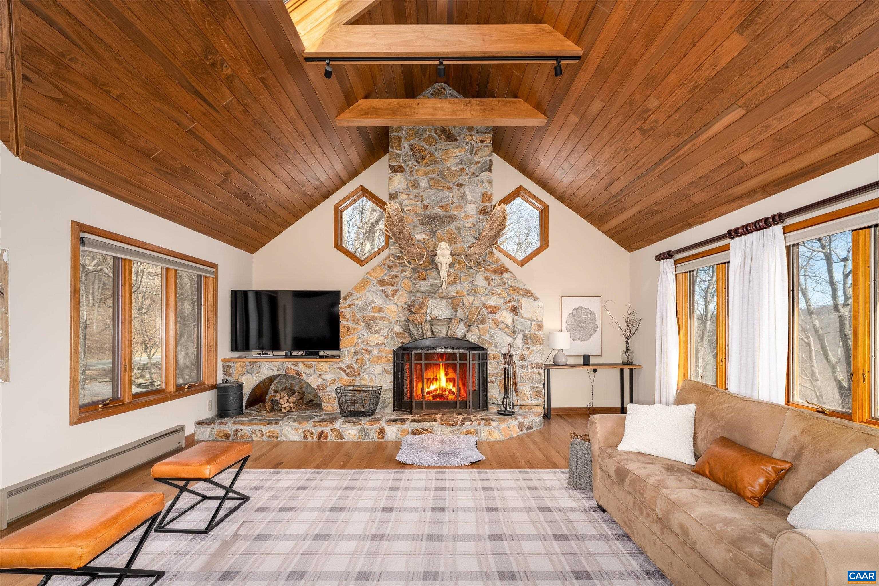 Nice Floor to ceiling stone fireplace