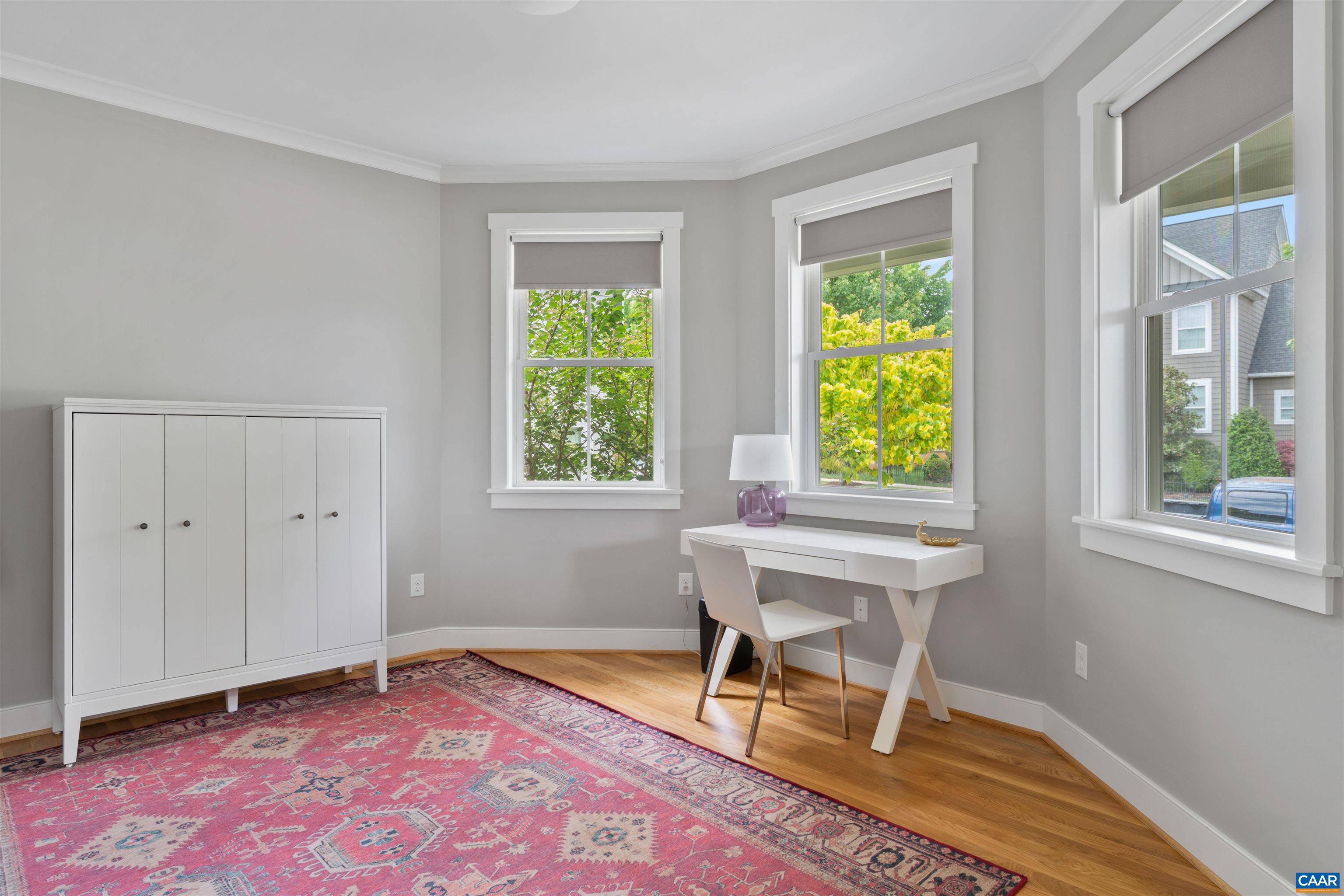 This main level room can be used as an office or fifth bedroom.