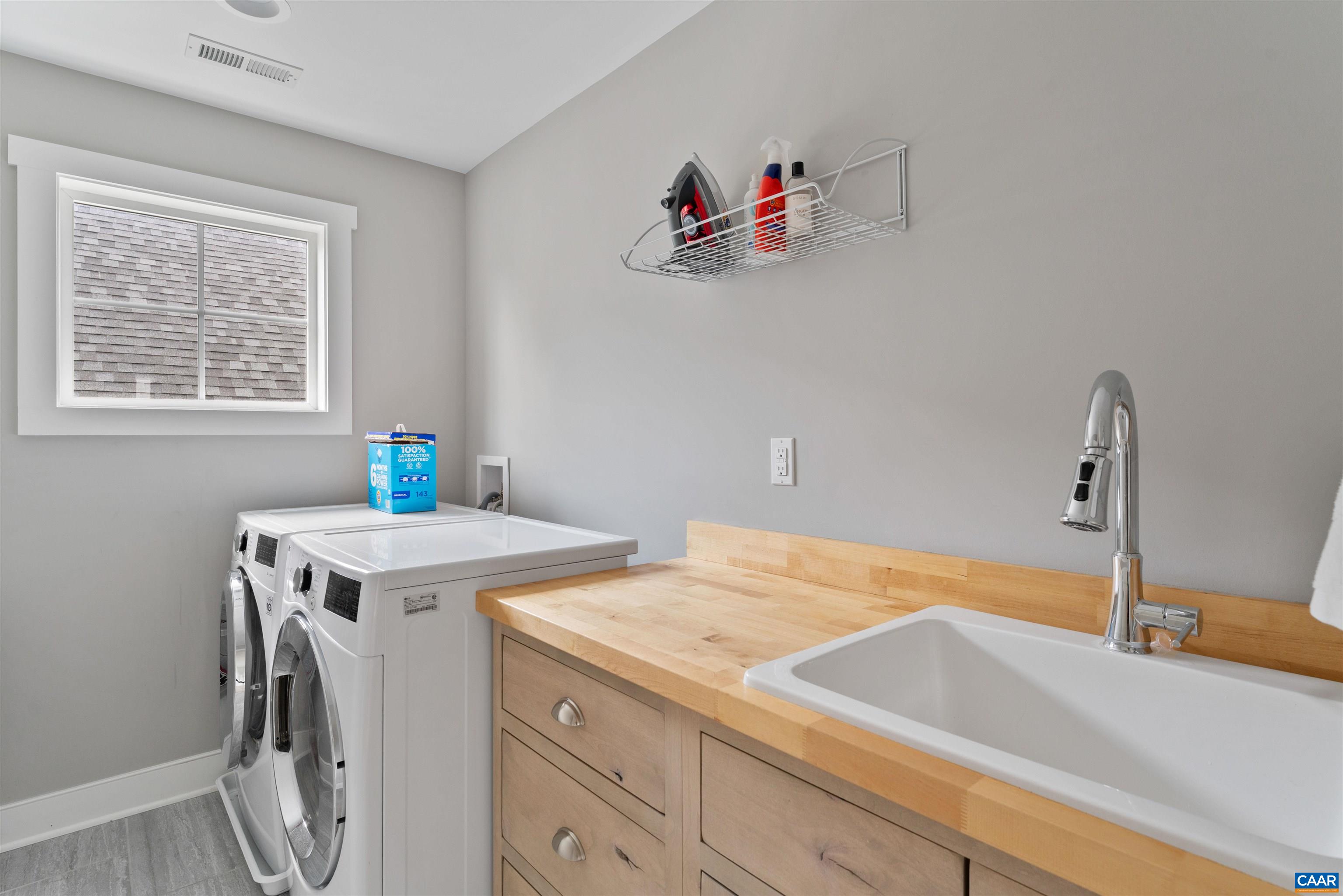 Located on second floor/bedroom level. Large utility sink.