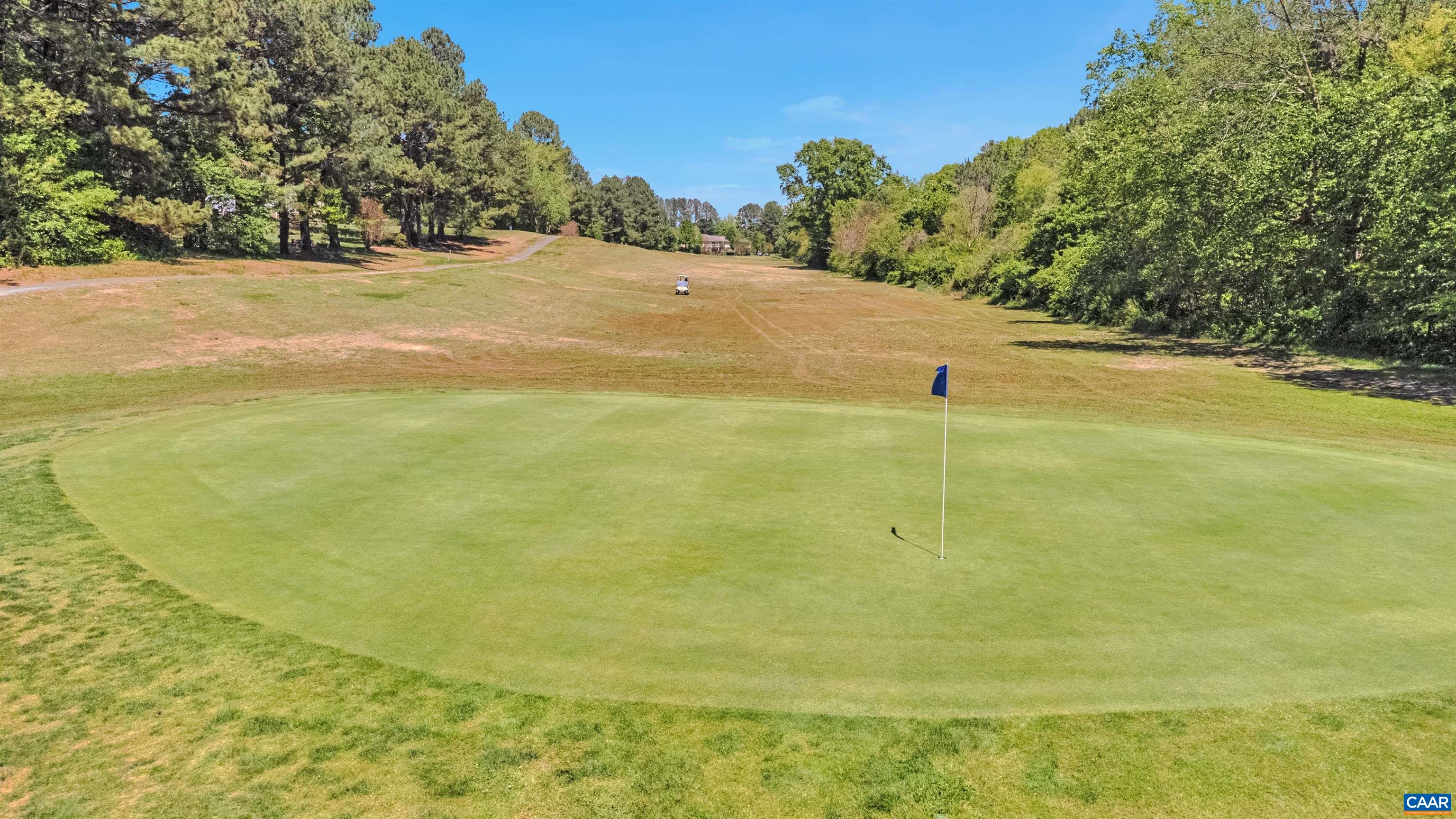 Green across the street adjoining vacant lot. The golf course is readily available.