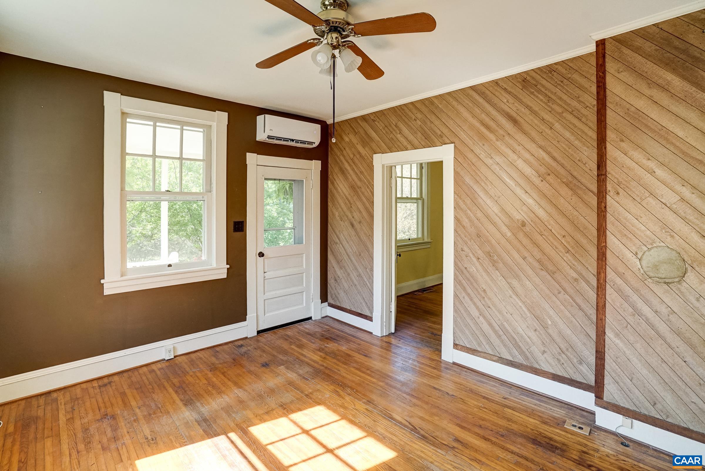 Wooden accent wall in living room.