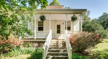 Charming 1930s cottage on 4.25 acres in Arrington!