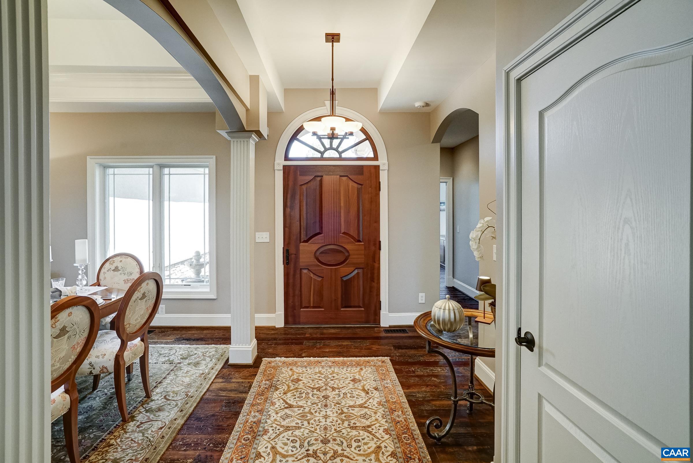 Stunning details throughout the home including upgraded trim, high ceilings and reclaimed barn hardwood floors throughout the main level.