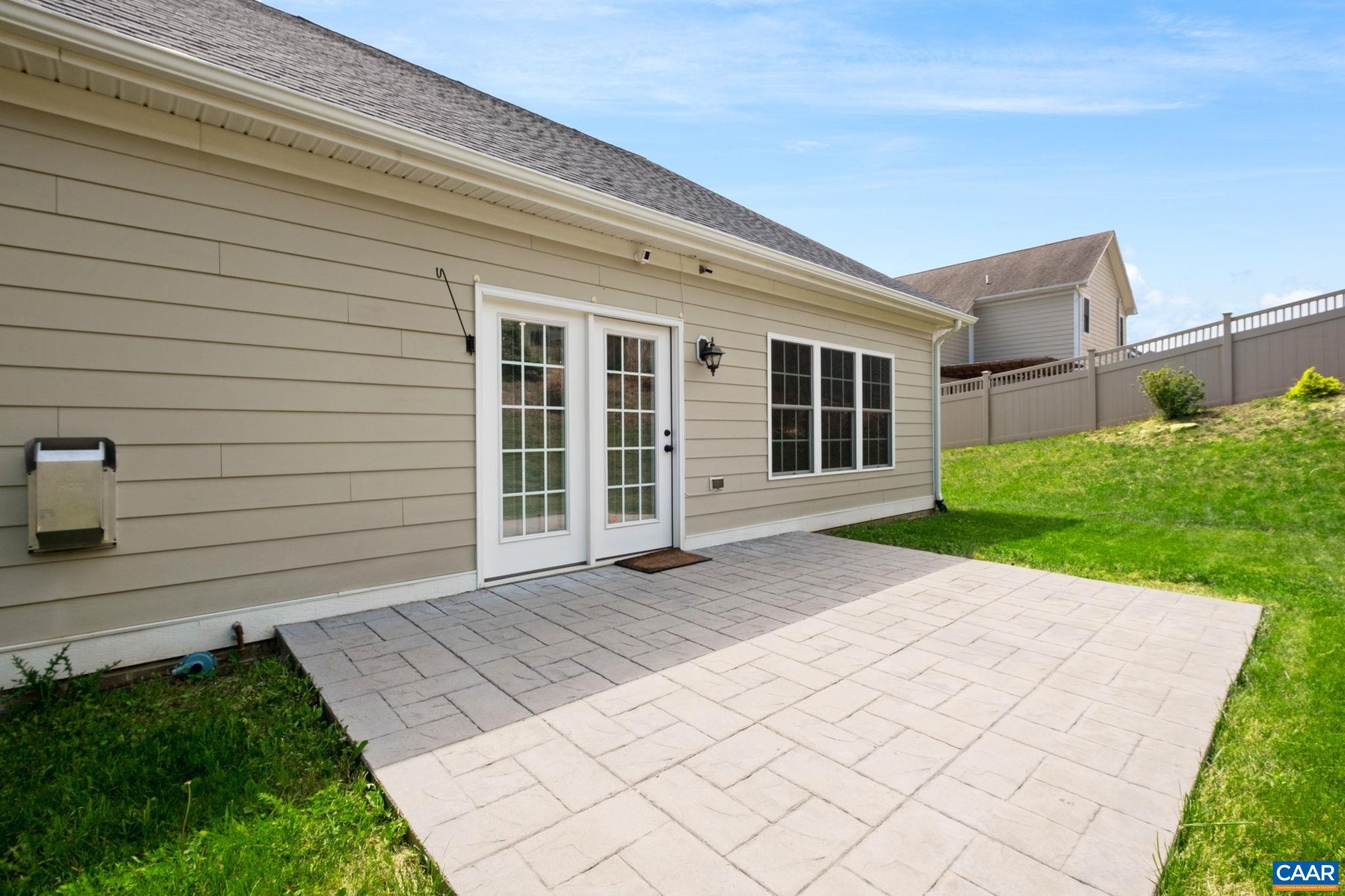 Dine or grill on the stamped concrete patio!