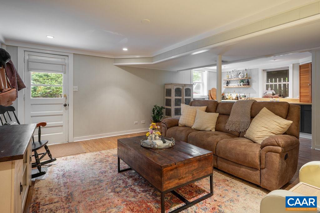 Finished, walk-out lower-level features a bedroom, full bath, and family room with wetbar -an ideal opportunity to create a basement apartment.