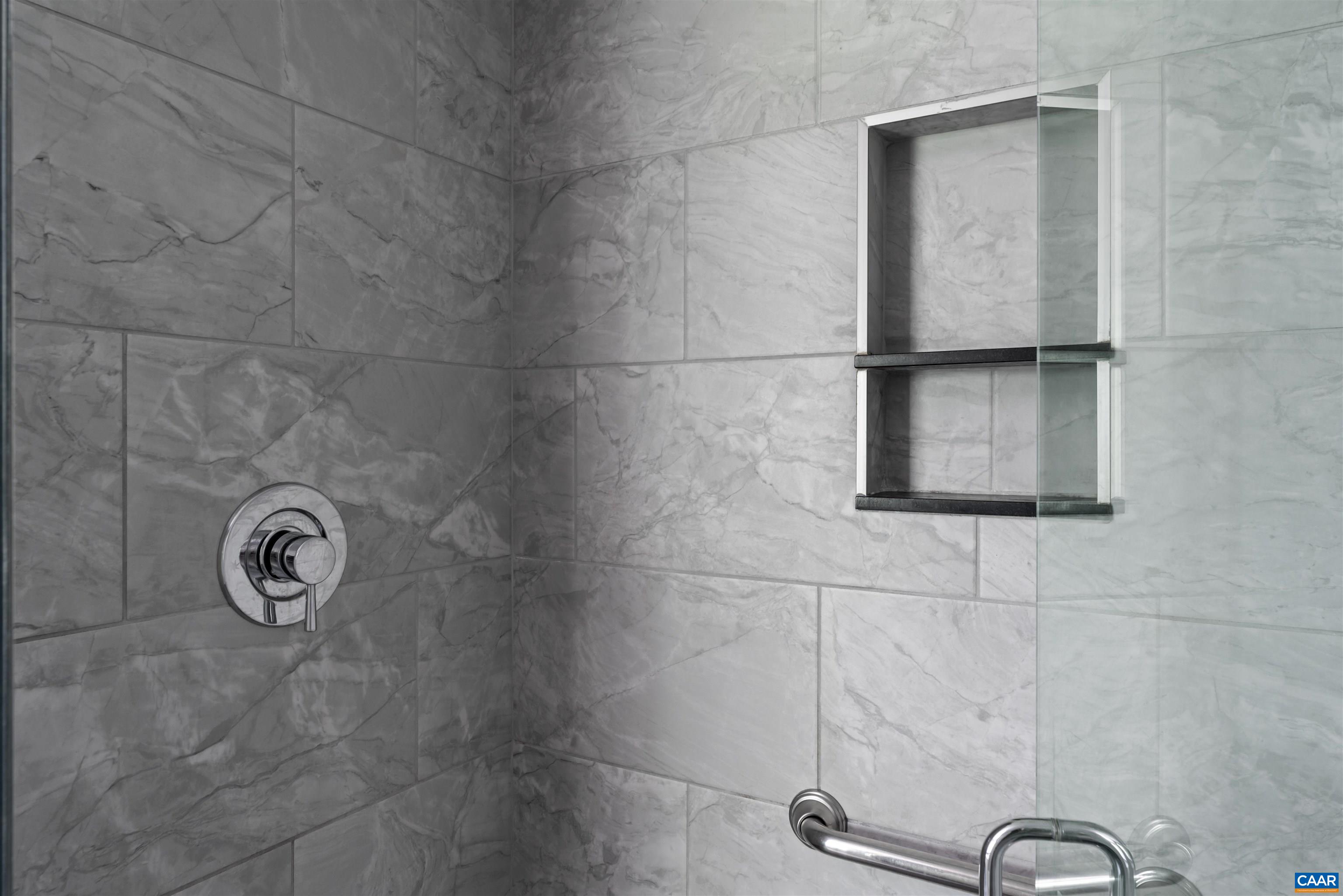 double head, pebble floor, chic tile