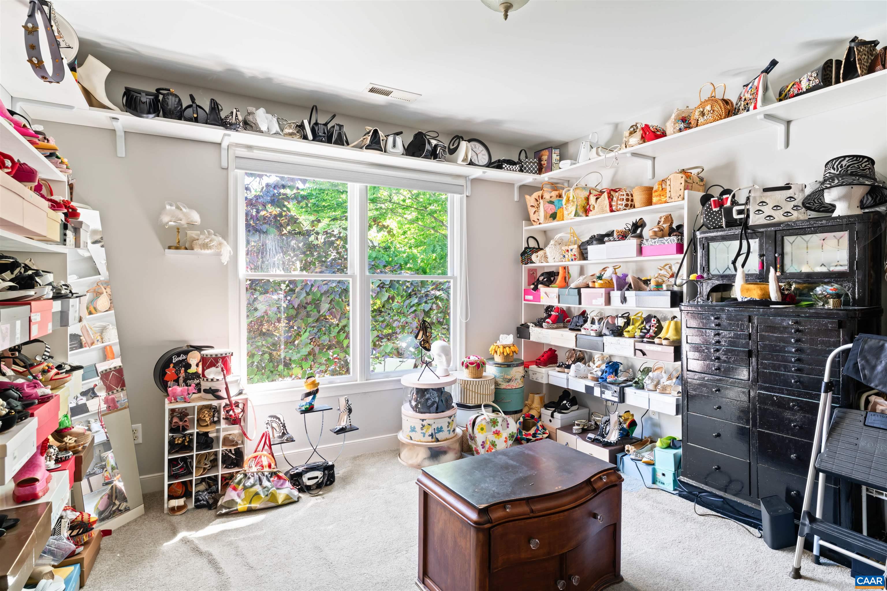 Versatile extra room off the primary that could be a nursery, office, yoga studio, etc