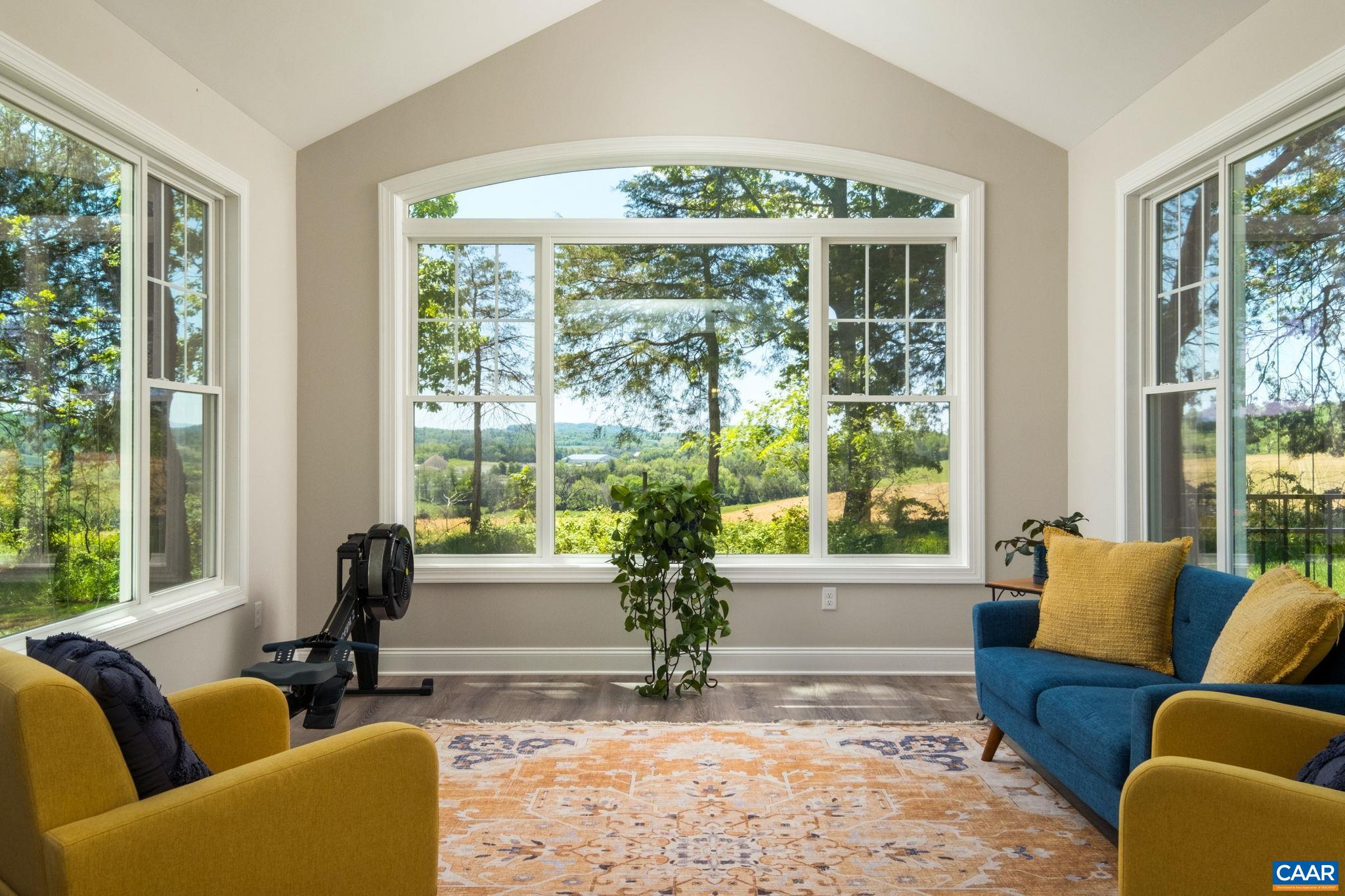 This may be your favorite spot in your new home!  This sunroom captures the beauty of open spaces from the comfort of your home.