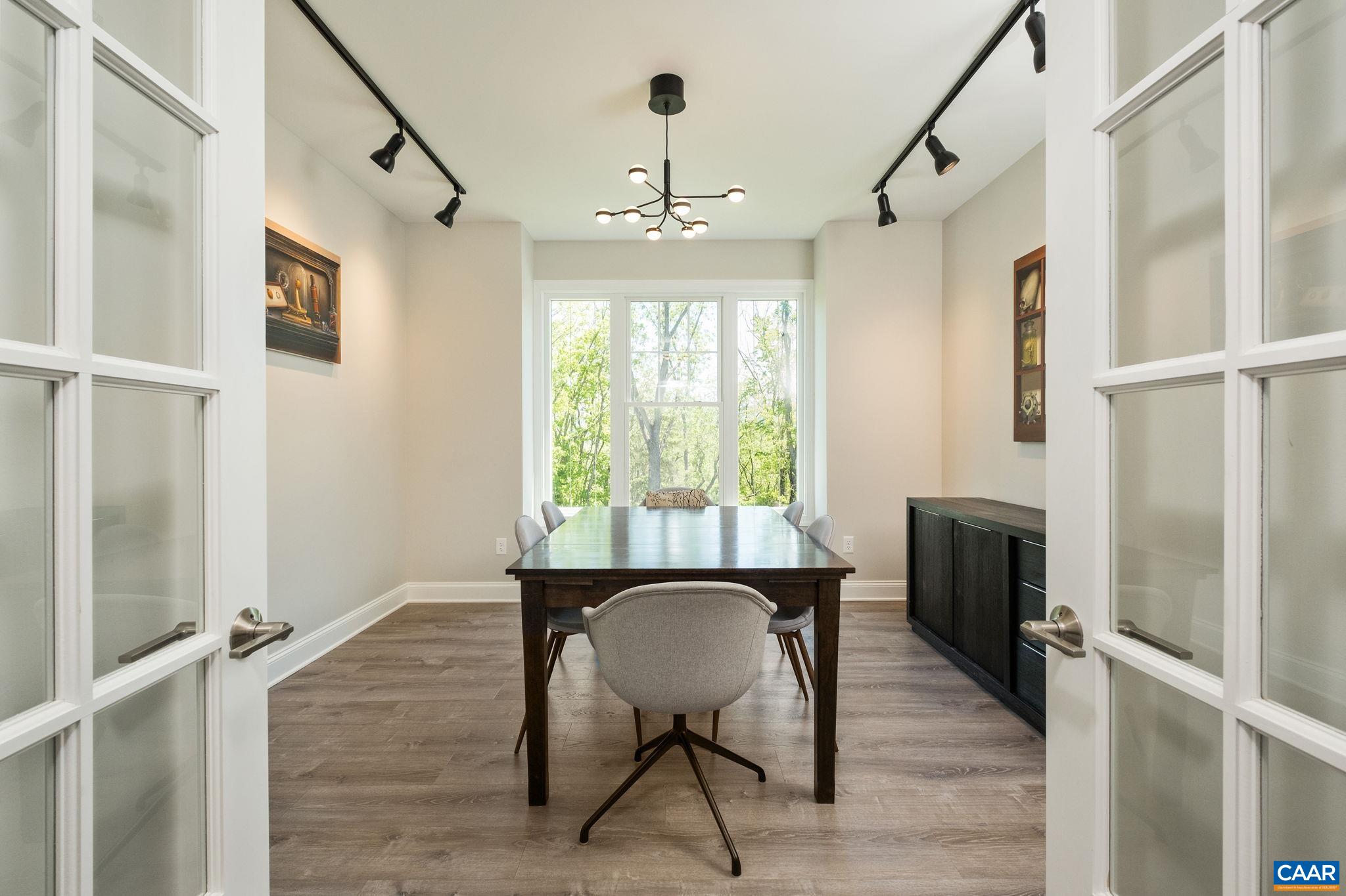 Bedroom 3 was turned into a home office, and features French doors.