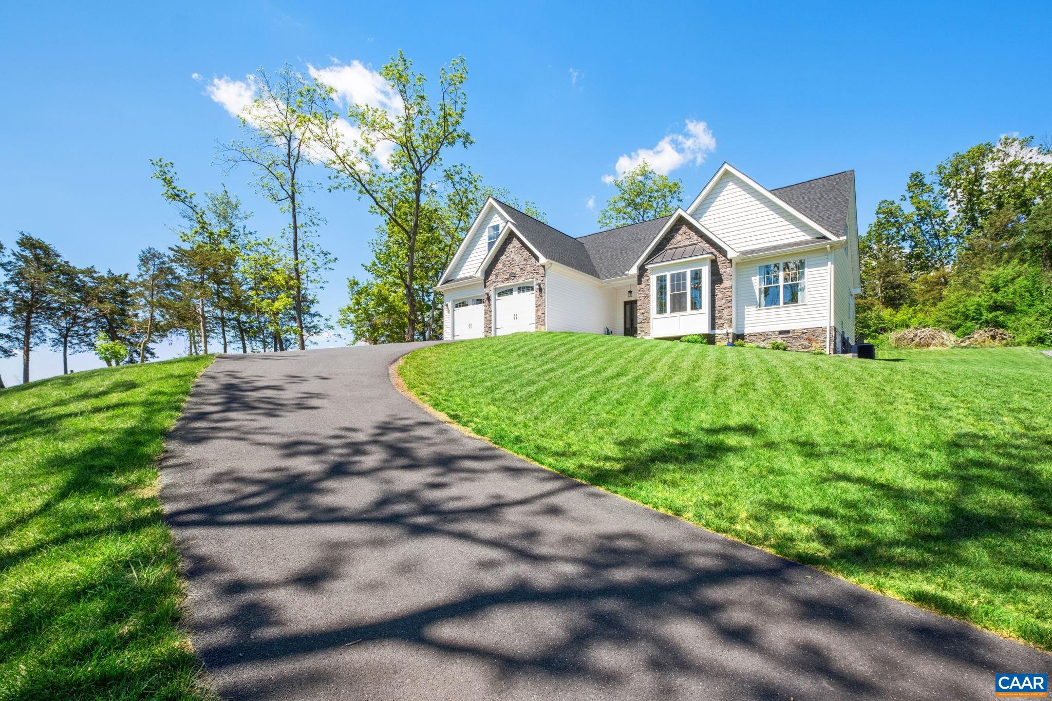 The home is perched on a hill for amazing views