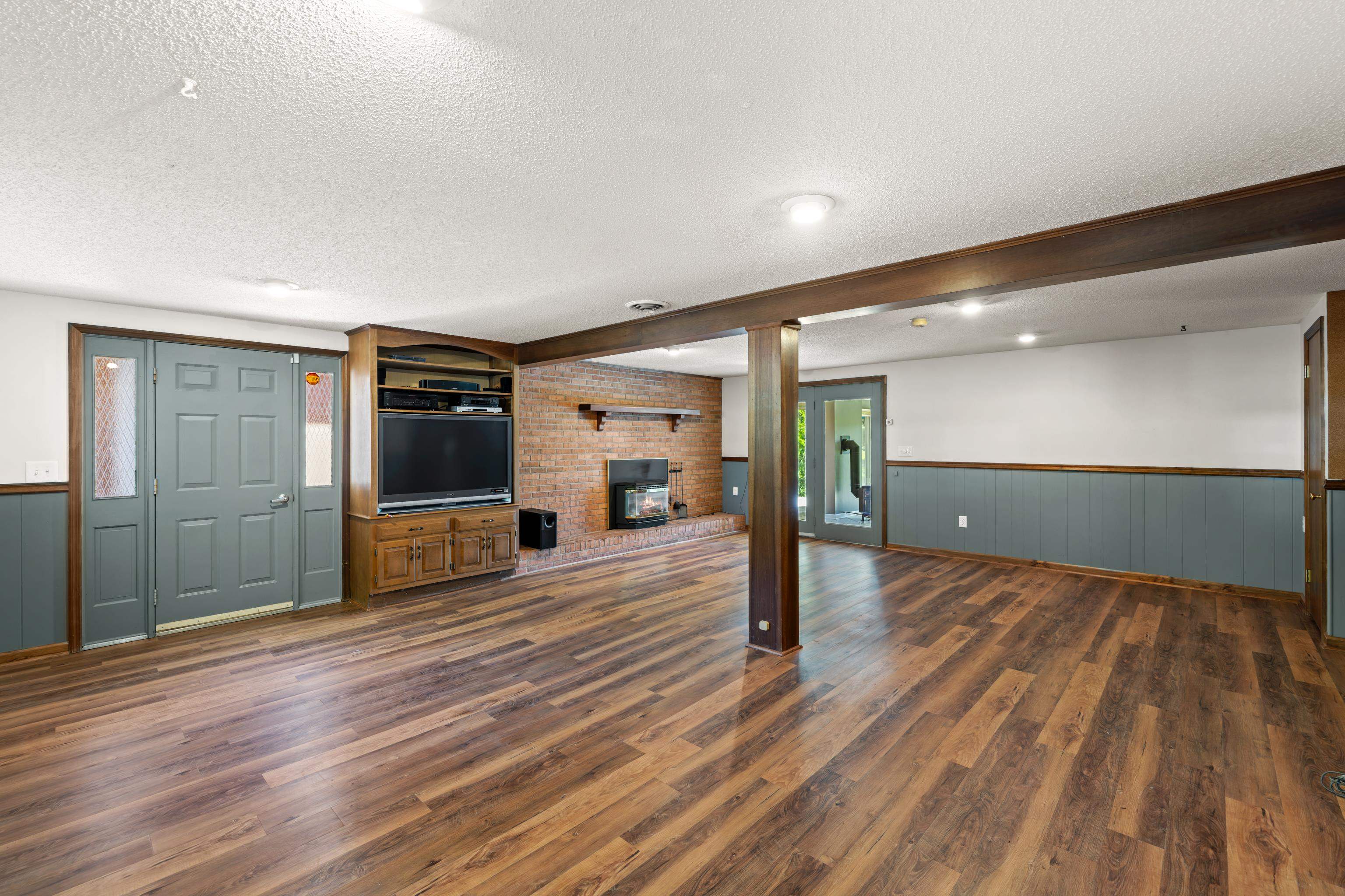Has media cabinet and propane fireplace.