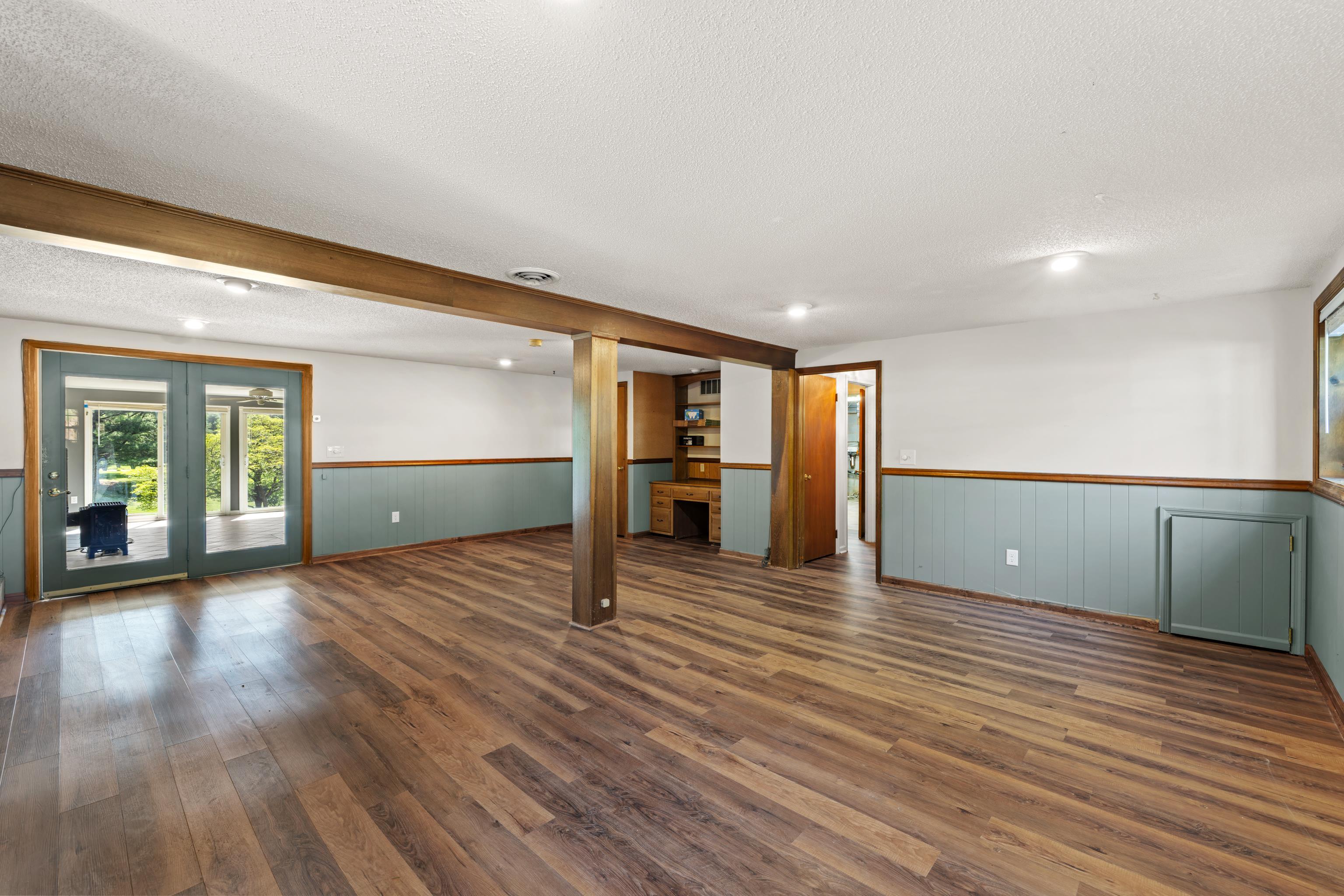 Built in desk and door to sunroom