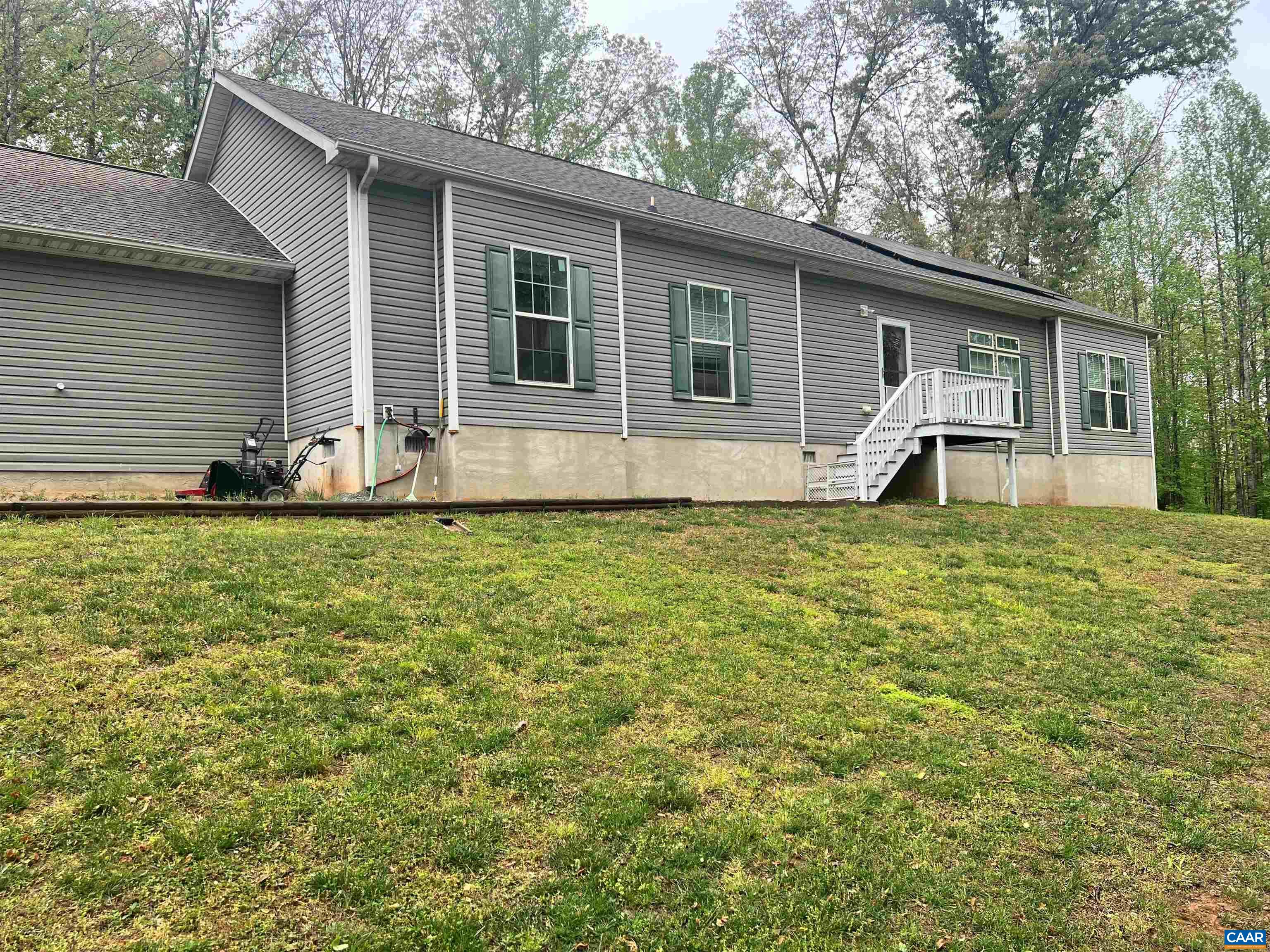 2100 sq ft. mini farm  hunting also adjacent over 5 acres  total 10 acs.