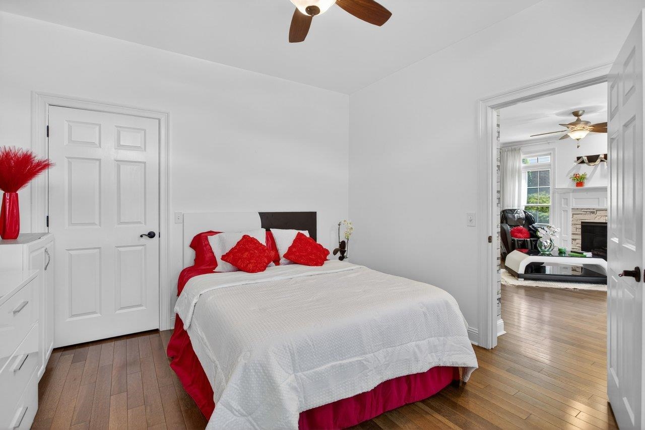 This main floor room right off the Living Room is currently used as a bedroom. It is also perfect for a den or home office