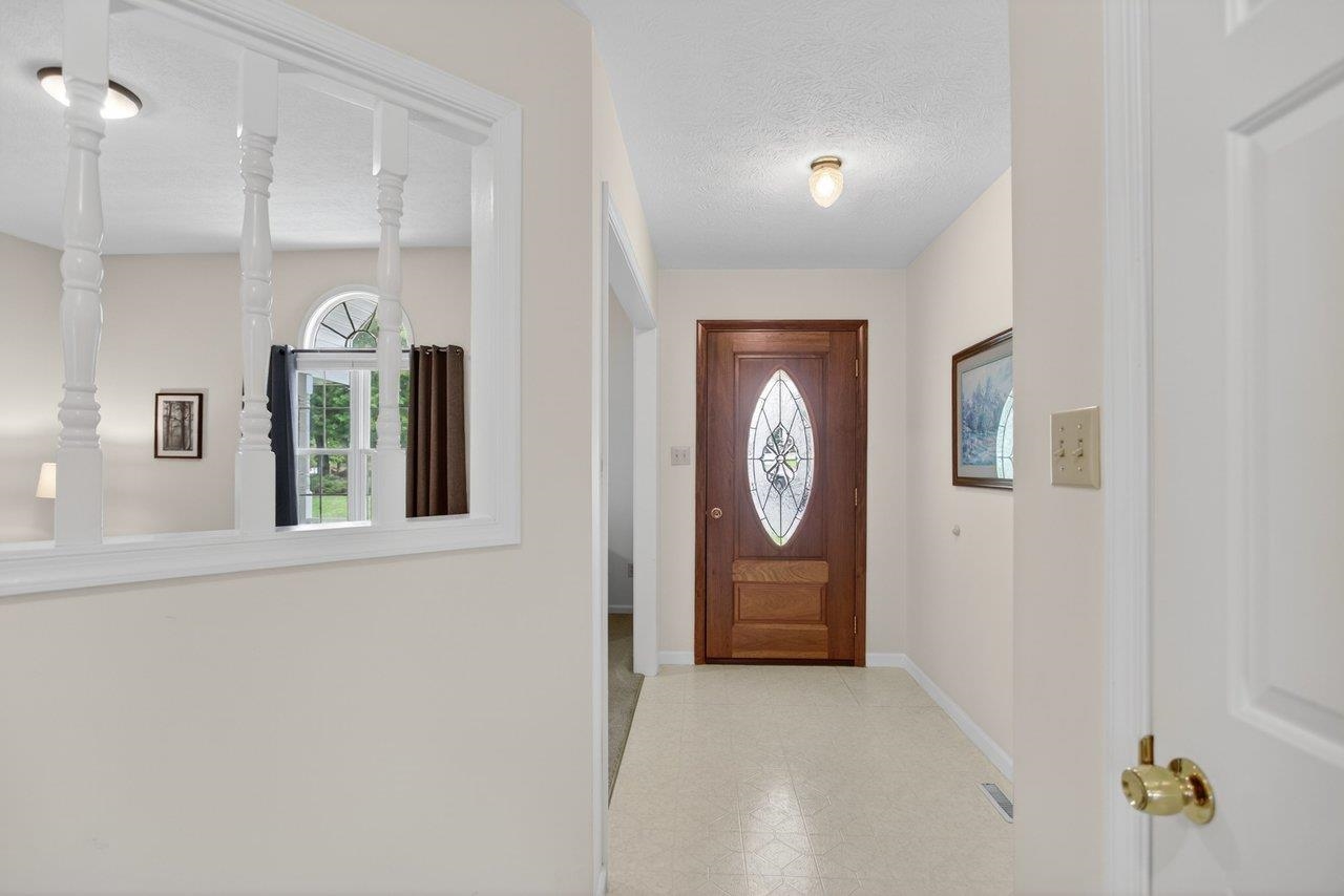 Features; vinyl flooring and coat closet