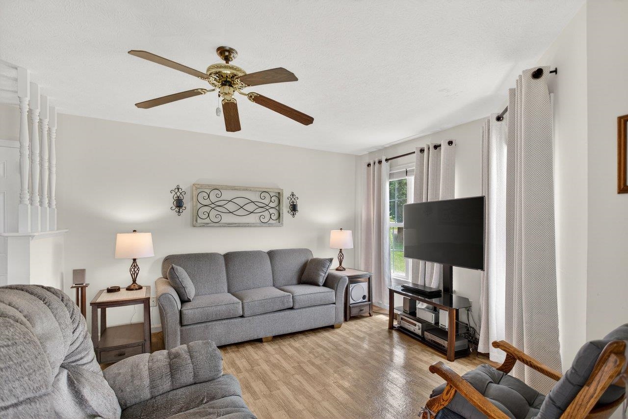 Features; ceiling fan and vinyl flooring.