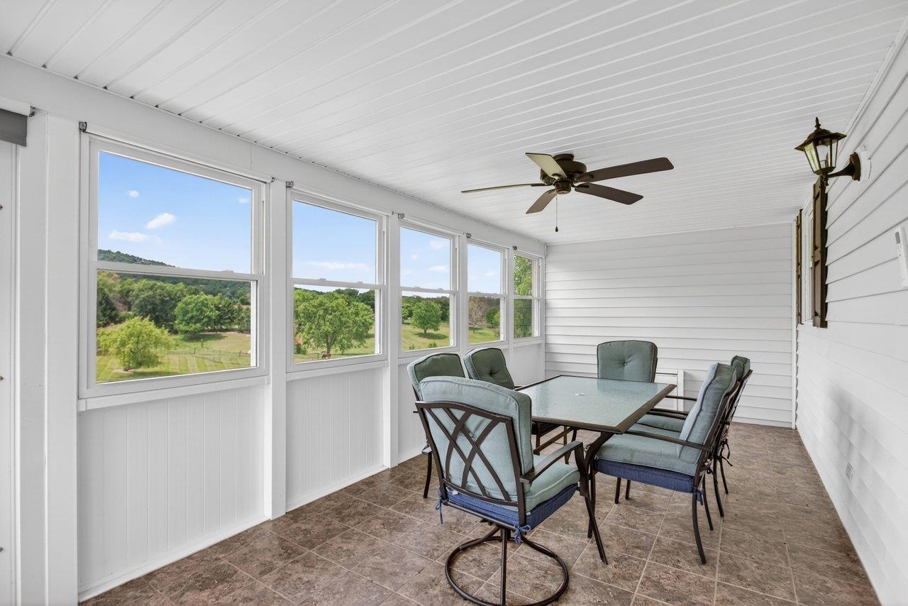 The sunroom is 23' x 10' and is maintenance free.