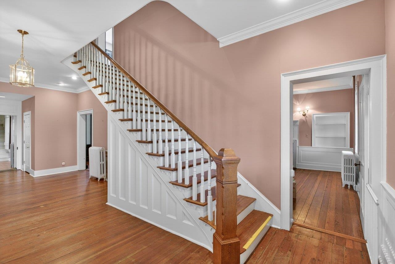 Hardwood abounds, but this open staircase shows it off