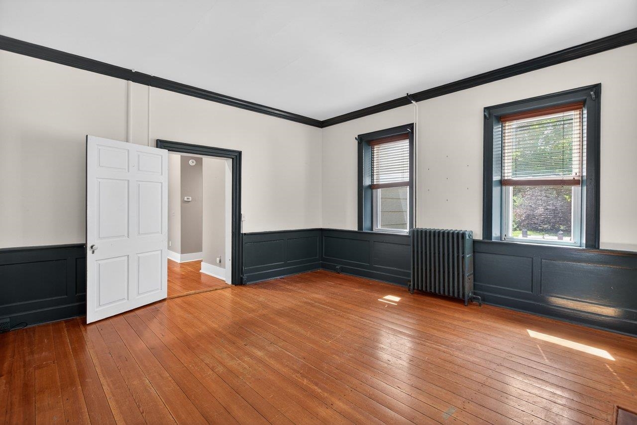Note the chair rail and the fireplace.