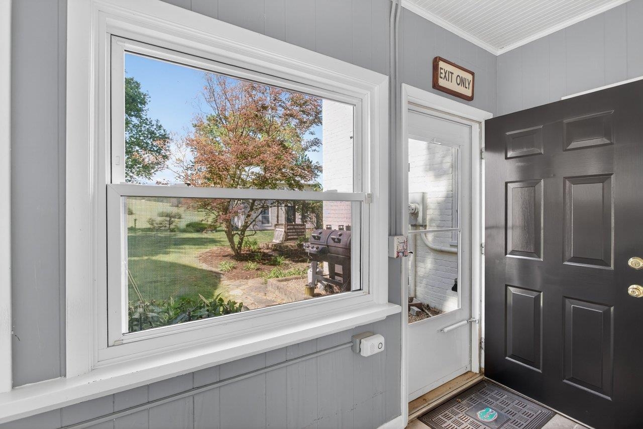 This is the side door entrance. Upon entering this space will take you into the kitchen.
