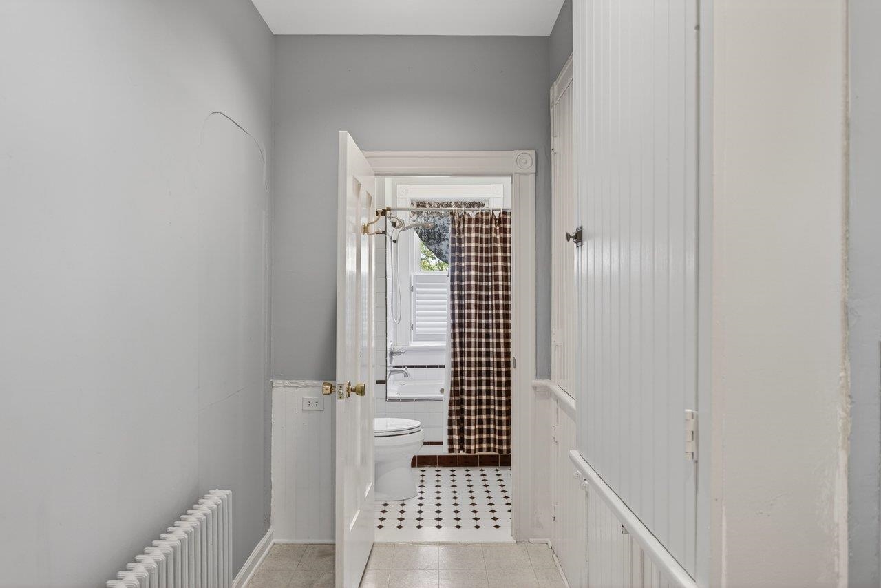 Tucked away in the back of the house, a full bathroom.