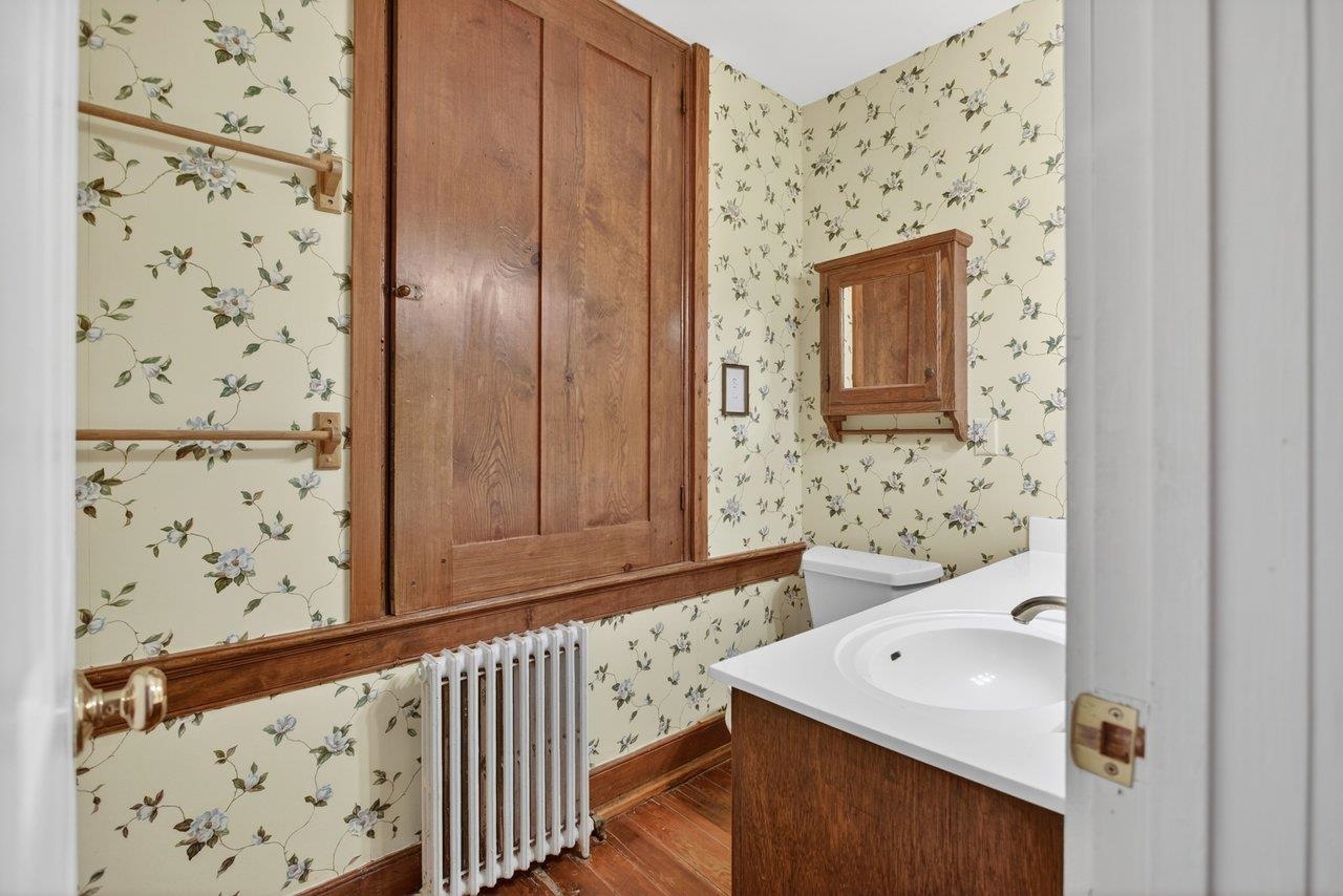This bathroom is located at the top of the stairs across from Bedroom 2.