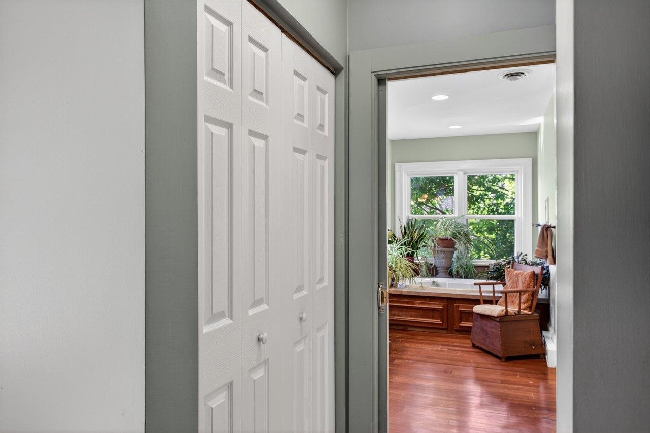 This primary bedroom not only has the private bathroom and a full boudoir, there are more closets as well.