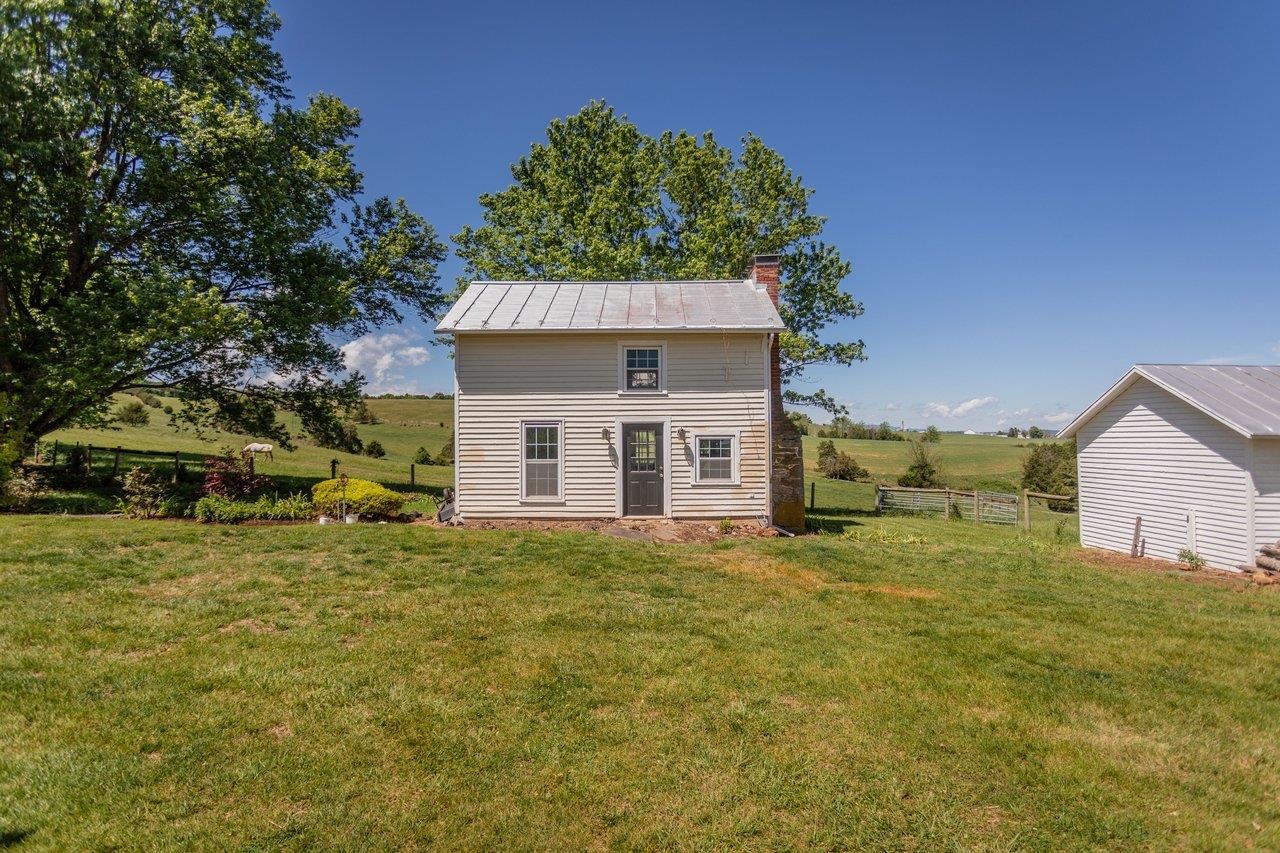 This guest house was used in the past, upper level is mostly finished, lower level would love some TLC