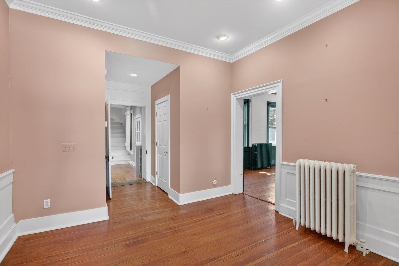 The foyer actually runs from the front entry of the home almost to the kitchen at the back.