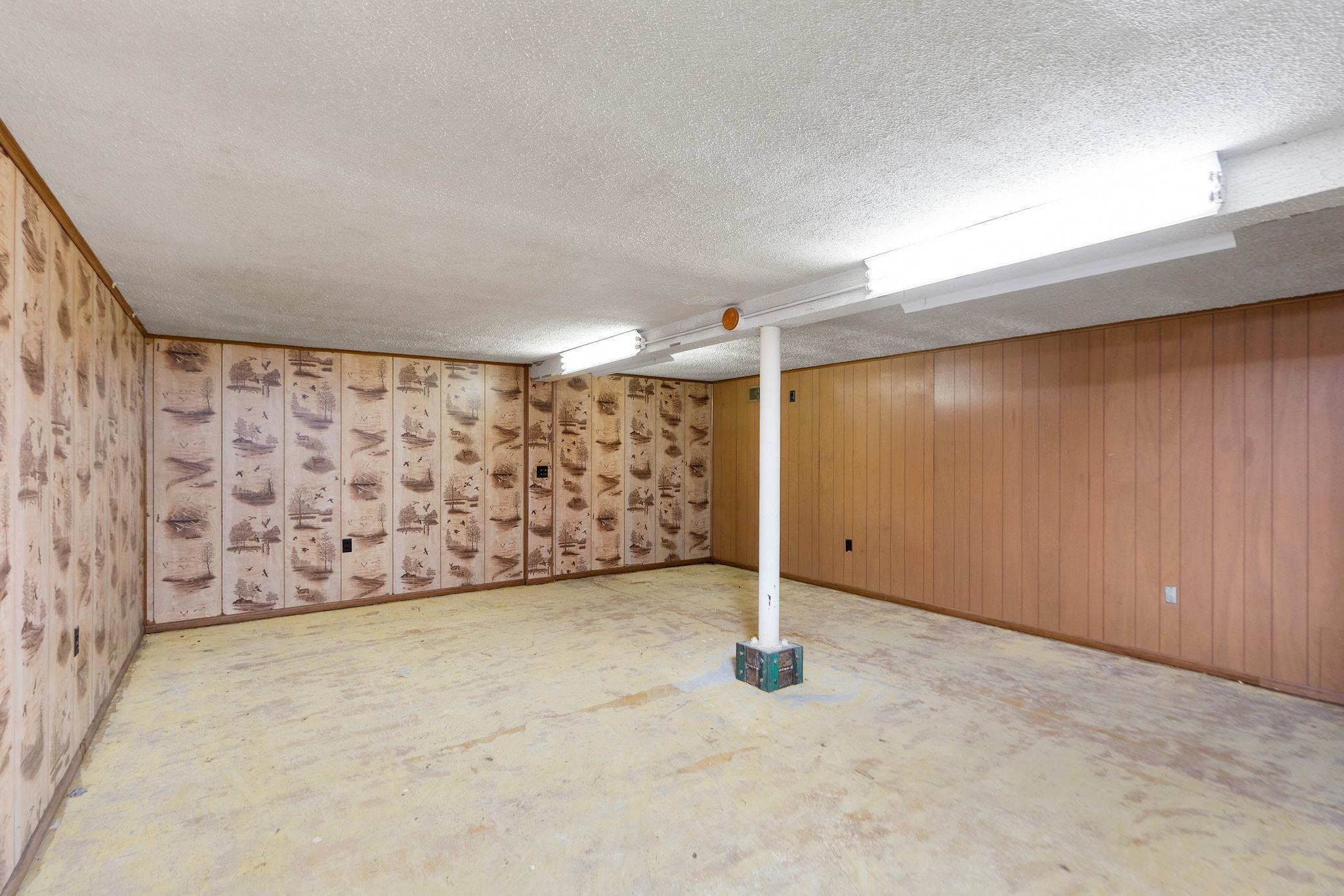 ...located under the garage, access through utility room. ...located under the garage, access through utility room.