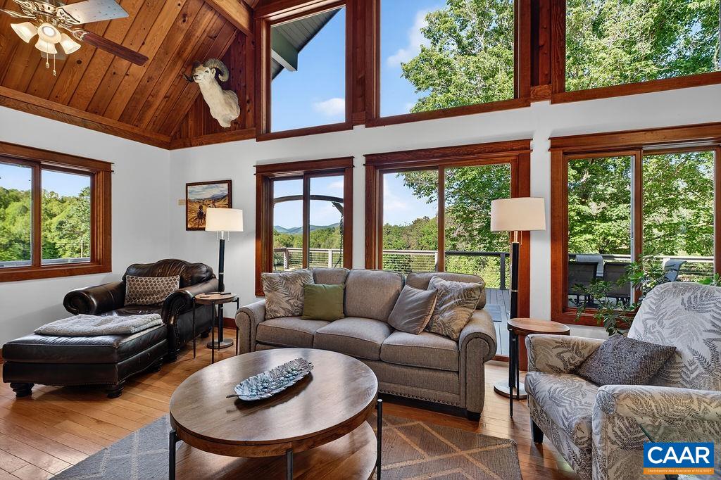 A dramatic wall of windows in the great room perfectly frames the magnificent mountain and sunrise views, allowing you to enjoy the beauty of the landscape from the comfort of your home.