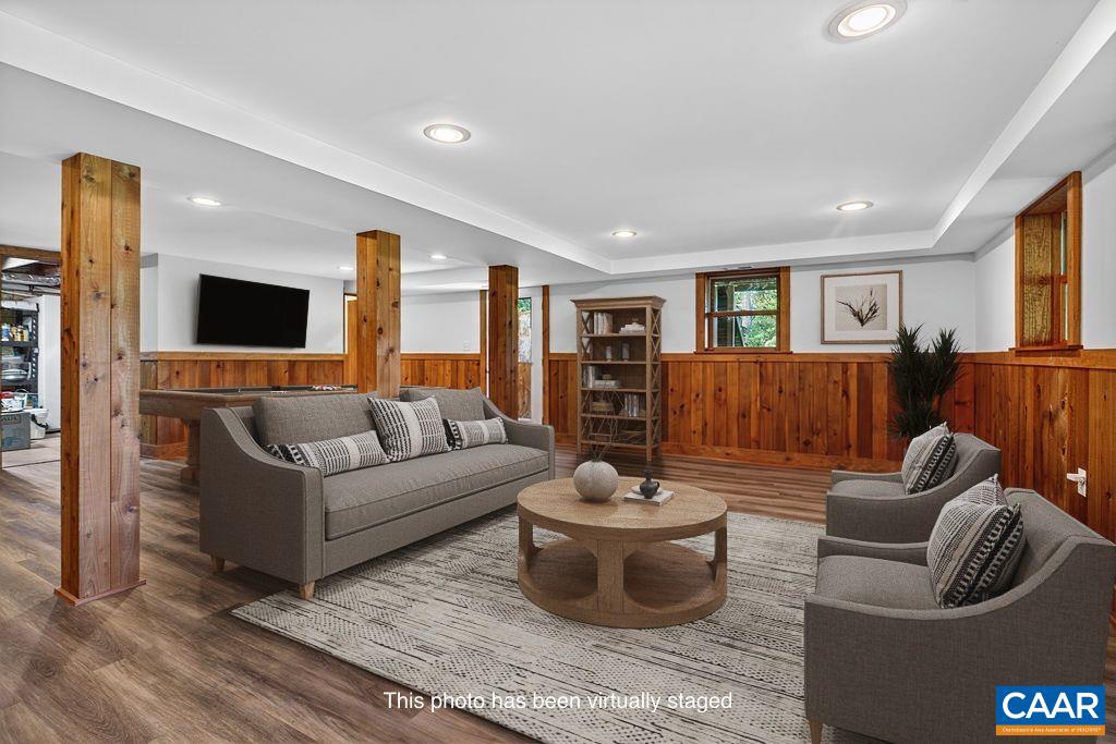 The basement spans the full footprint of the home, with nearly 750 finished sq ft featuring a spacious family room with a wood-burning fireplace and a full bath. The remaining unfinished area provides exceptional storage and offers endless potential.