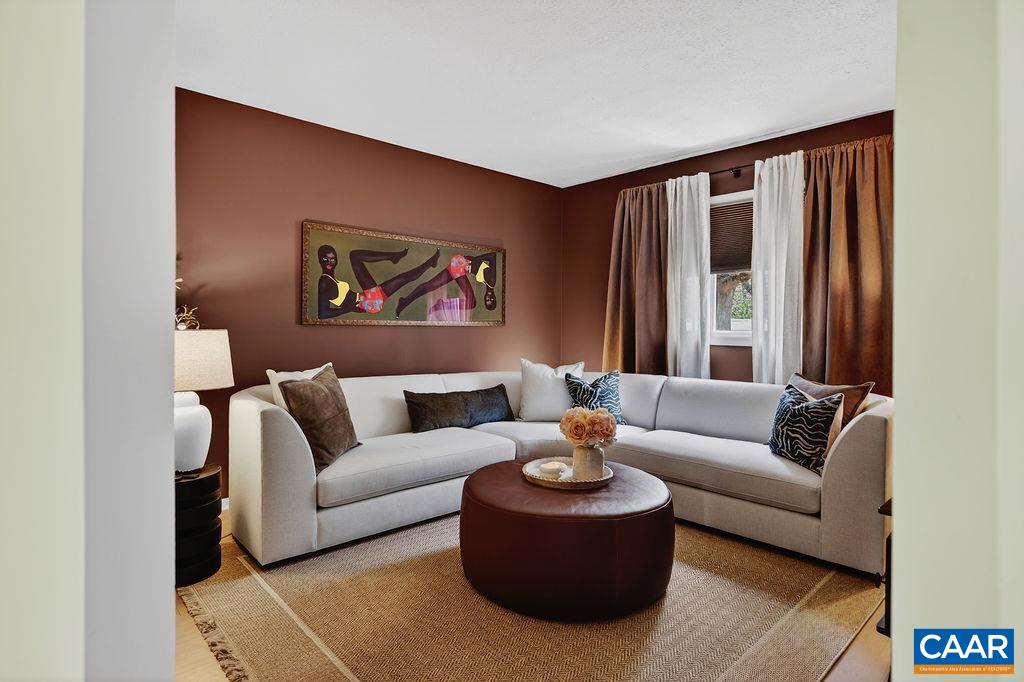 The room also features blackout shades, creating the perfect ambiance for a true home theater experience.