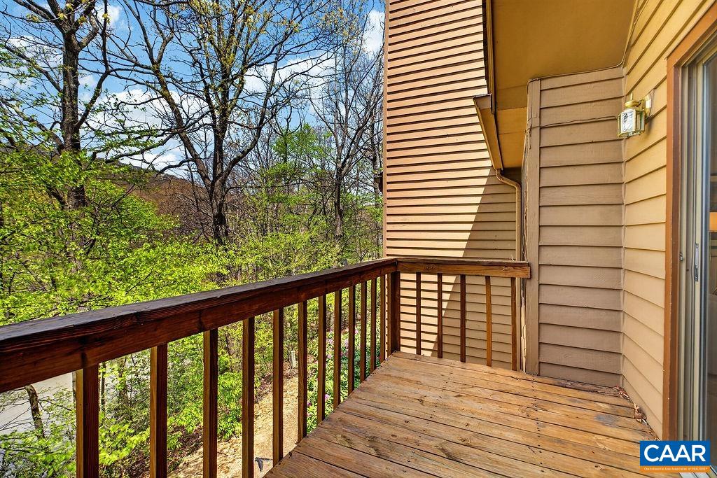 Nice main-level deck overlooking beautiful wooded surroundings.