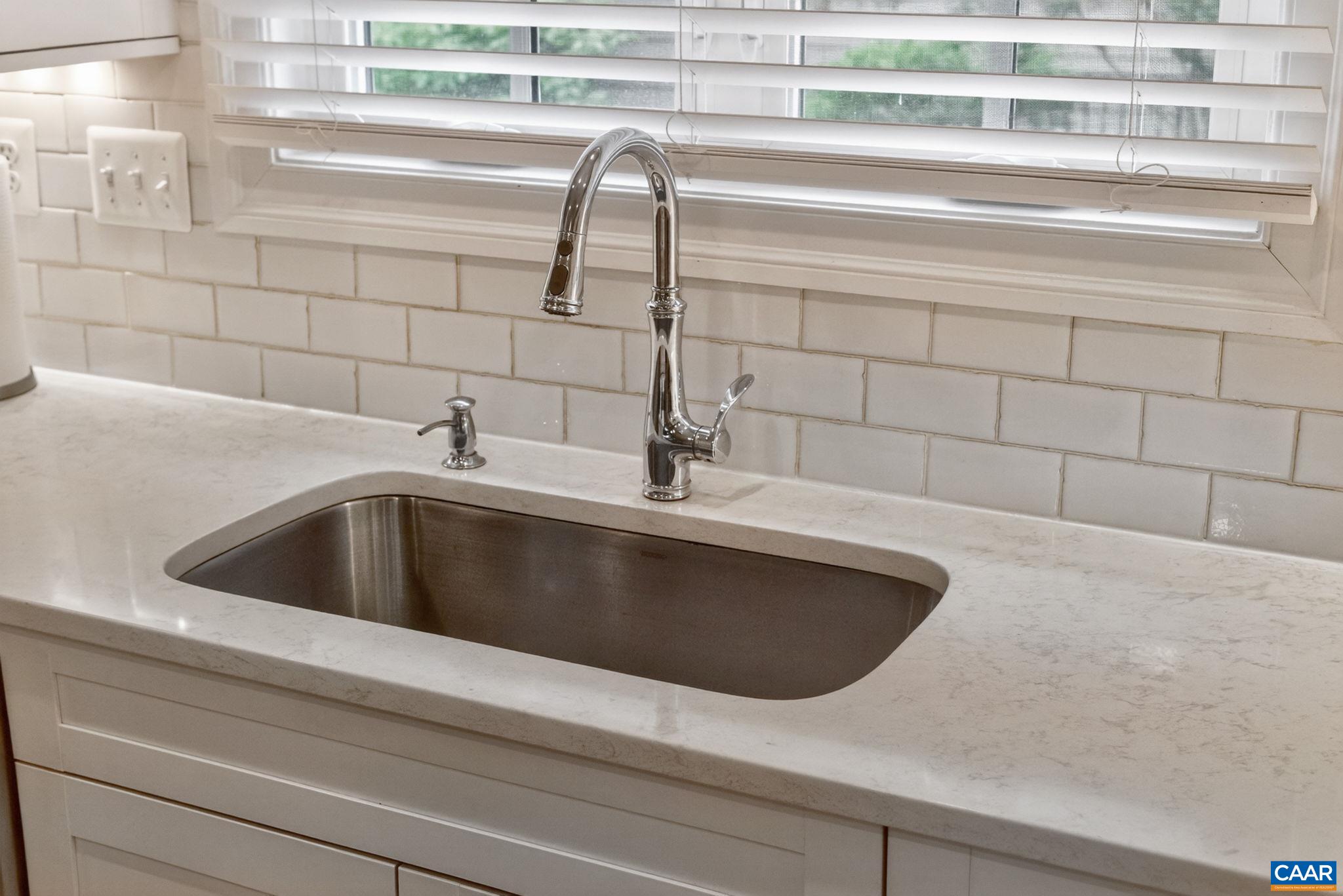 Large stainless kitchen sink.