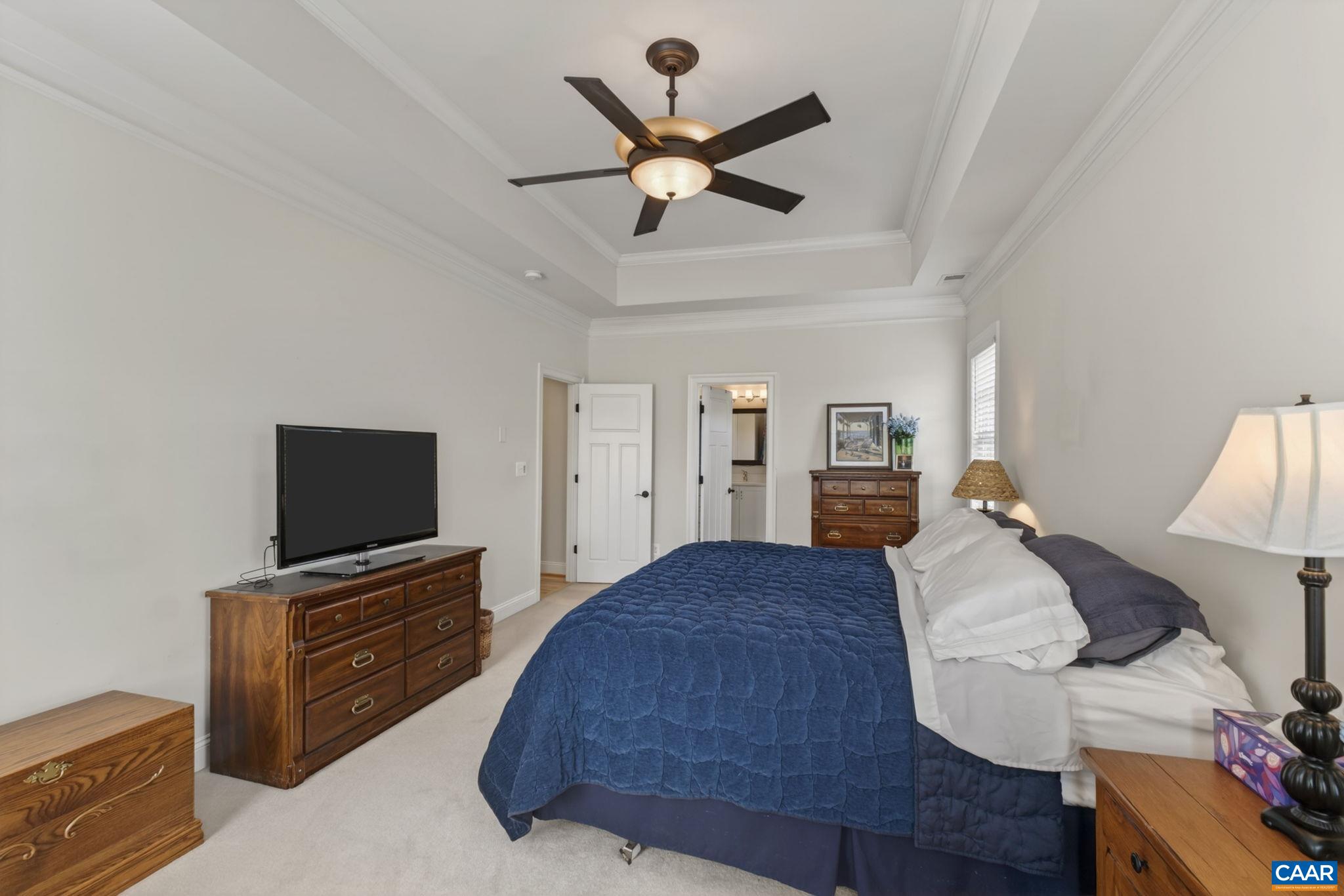 Primary bedroom with attached primary bath.