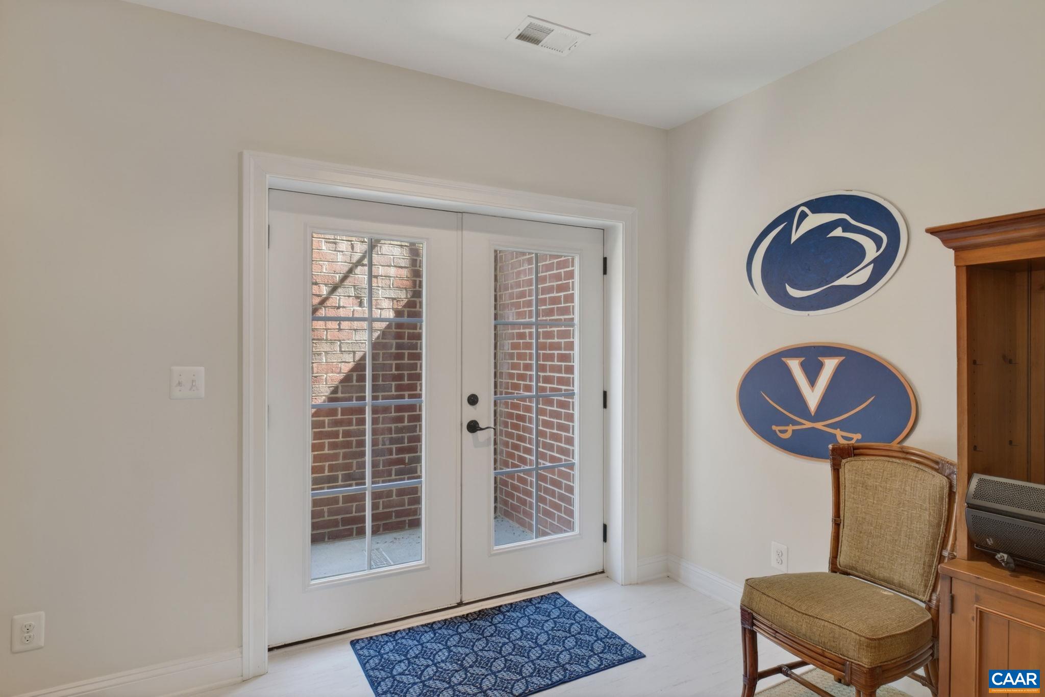 Lower level walk out/up double active French doors.