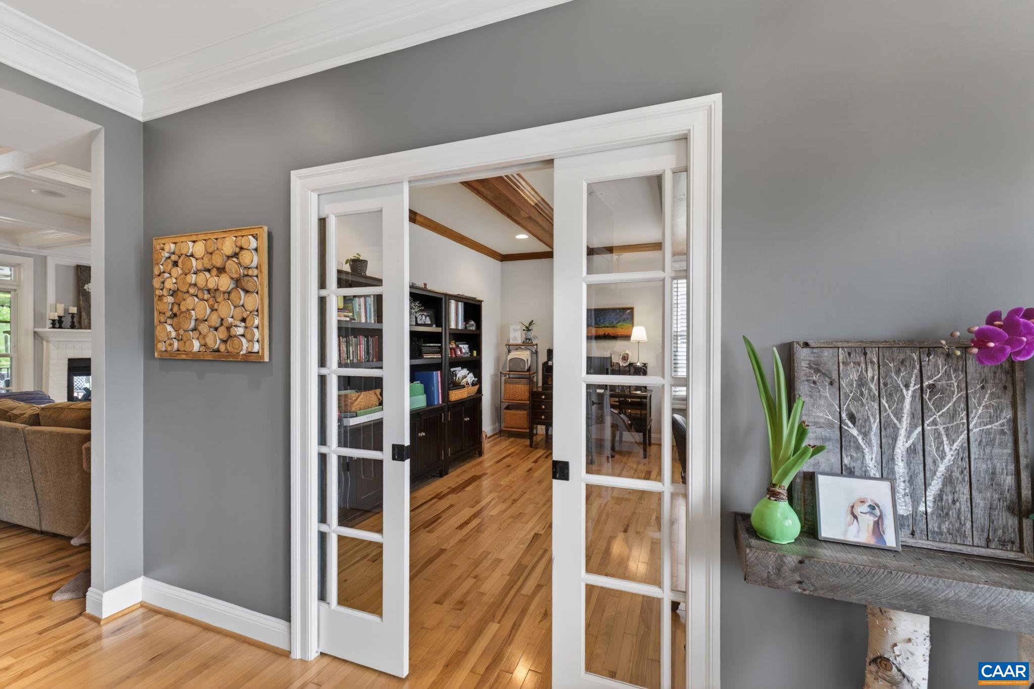 Home office off front foyer. Gleaming 3/4