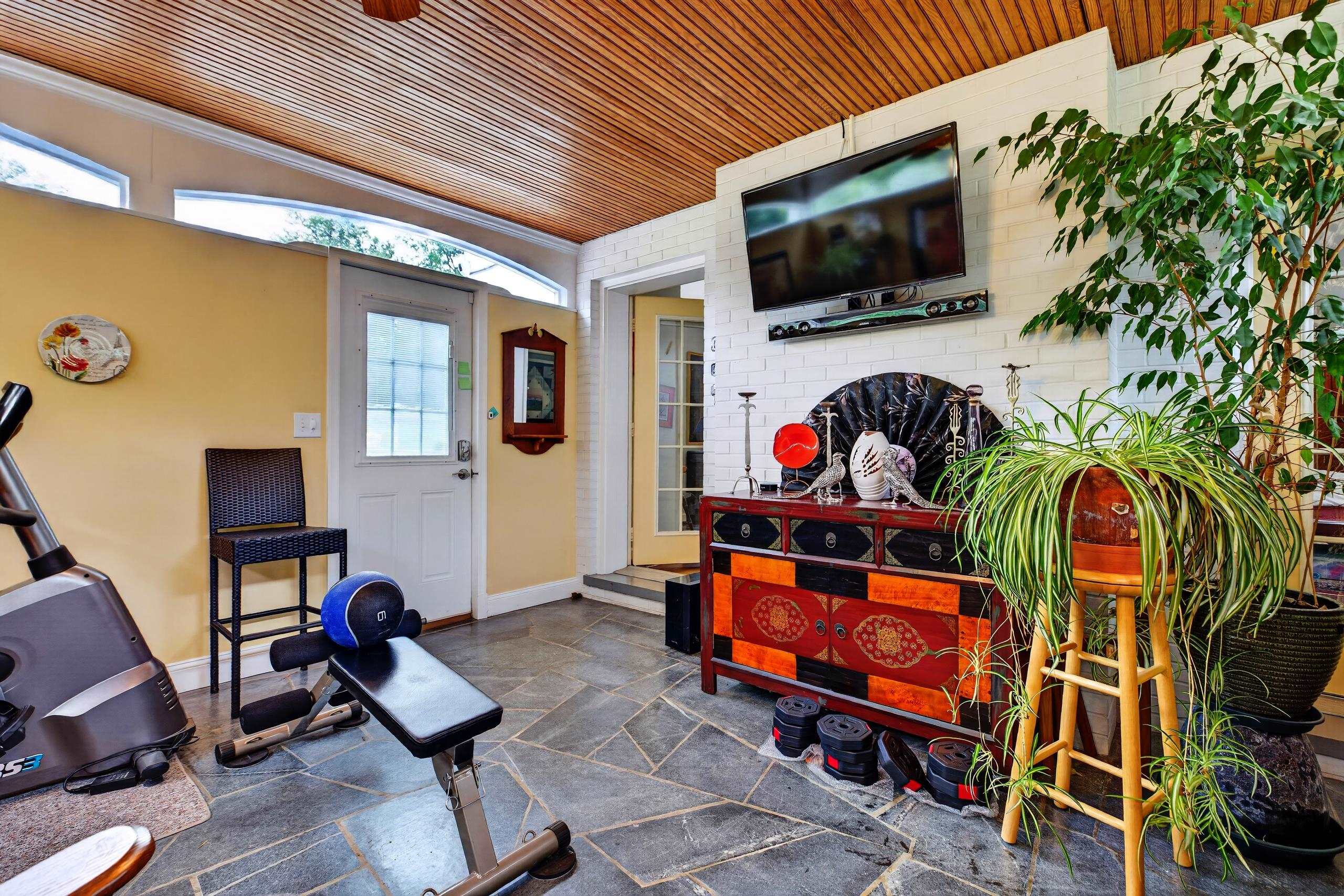 Soapstone floor with tree stone in center