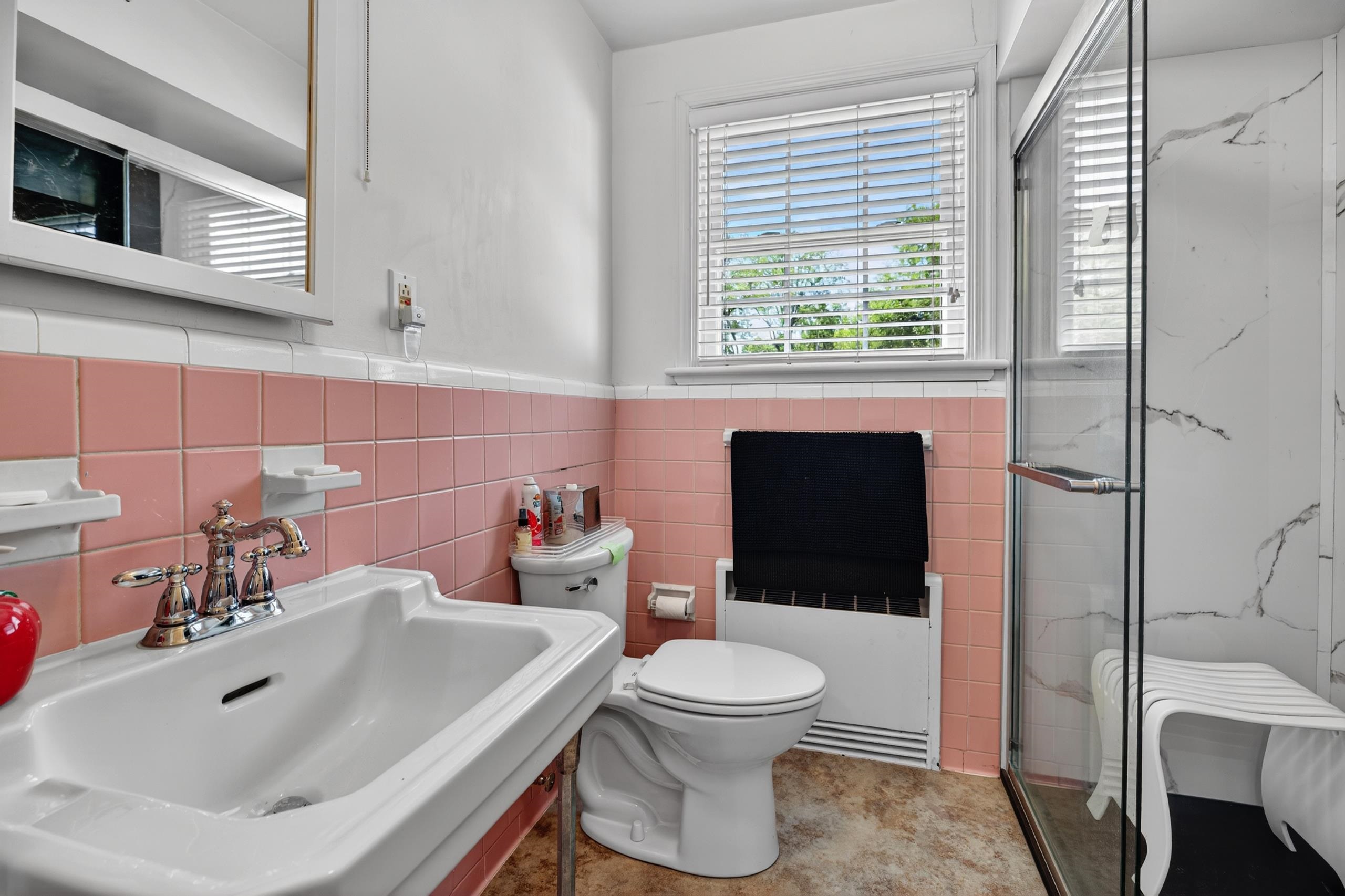 Bathroom with original pink tile