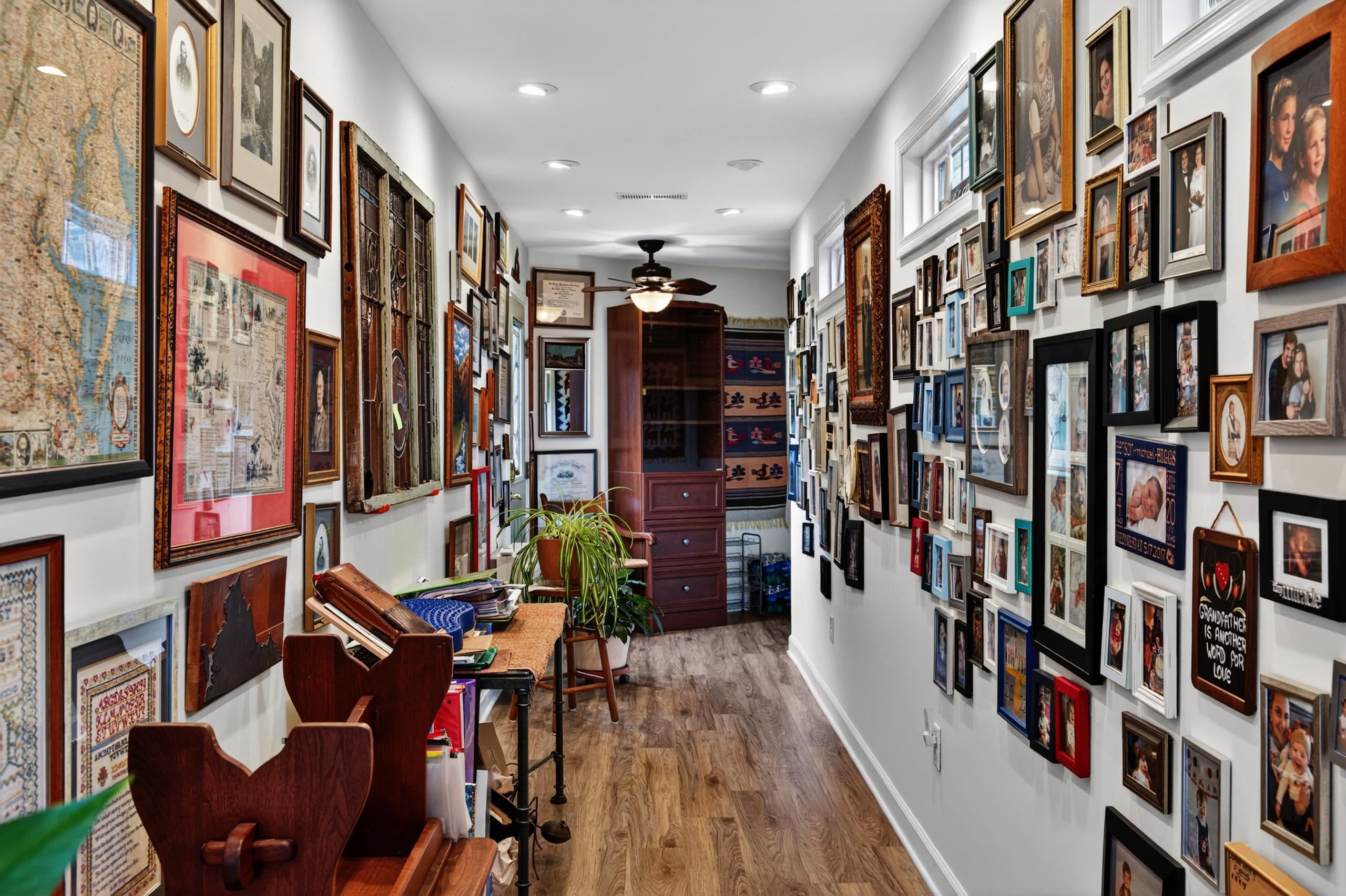 Extra wide breezeway leading to garage, used as Art and Photo Gallery